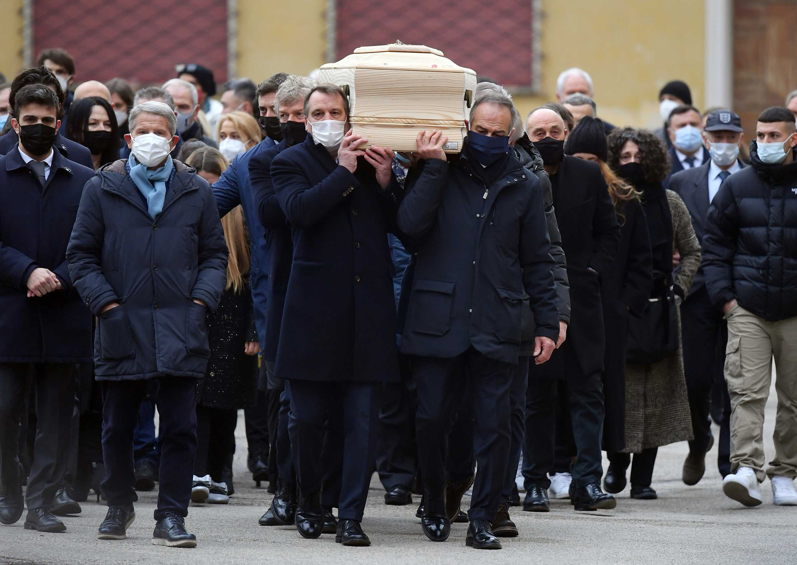 Soccer Football - Funeral for former Italy player Paolo Rossi - Vicenza Cathedral, Vicenza, Italy - December 12, 2020 Former Italy player Marco Tardelli and 1982 World cup teammates carry the coffin of Paolo Rossi outside the Vicenza Cathedral REUTERS