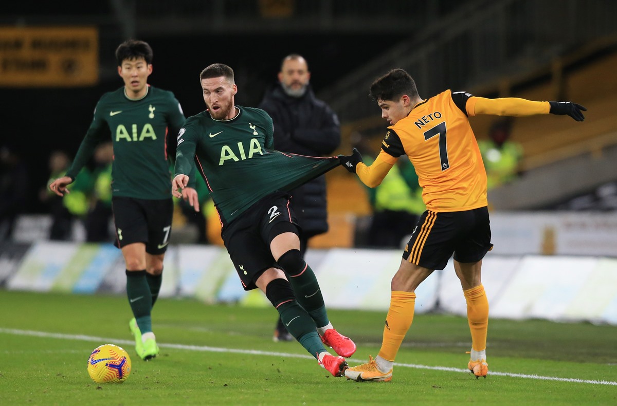 Soccer Football - Premier League - Wolverhampton Wanderers v Tottenham Hotspur - Molineux Stadium, Wolverhampton, Britain - December 27, 2020 Tottenham Hotspur's Matt Doherty in action with Wolverhampton Wanderers' Pedro Neto Pool via REUTERS