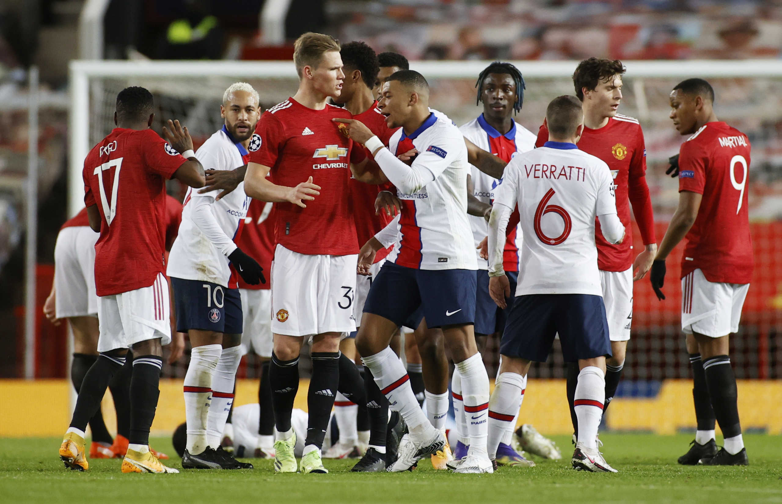 Soccer Football - Champions League - Group H - Manchester United v Paris St Germain - Old Trafford, Manchester, Britain - December 2, 2020 Paris St Germain's Kylian Mbappe clashes with Manchester United's Scott McTominay REUTERS