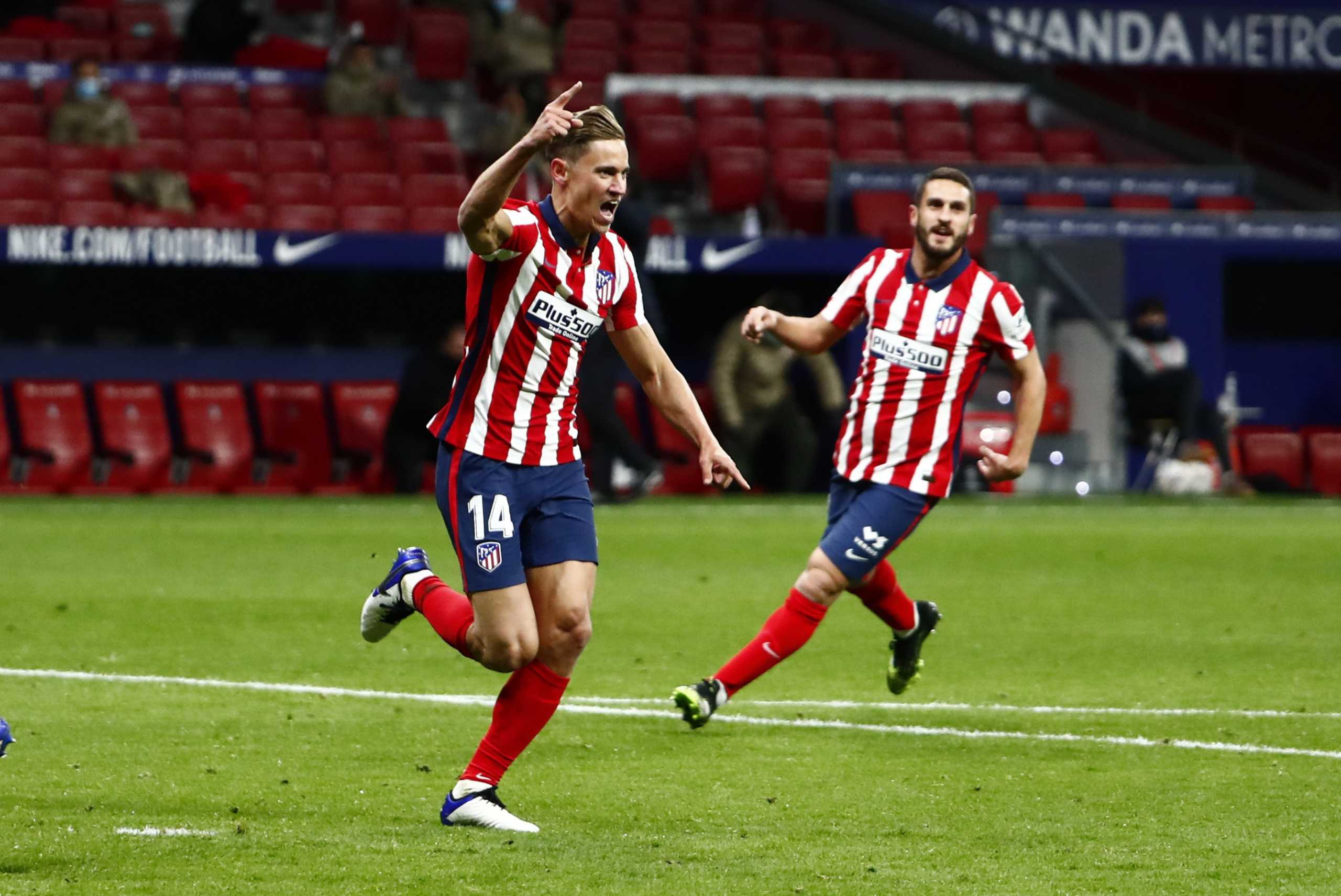 Soccer Football - La Liga Santander - Atletico Madrid v Real Valladolid - Wanda Metropolitano, Madrid, Spain - December 5, 2020  Atletico Madrid's Marcos Llorente celebrates scoring their second goal REUTERS