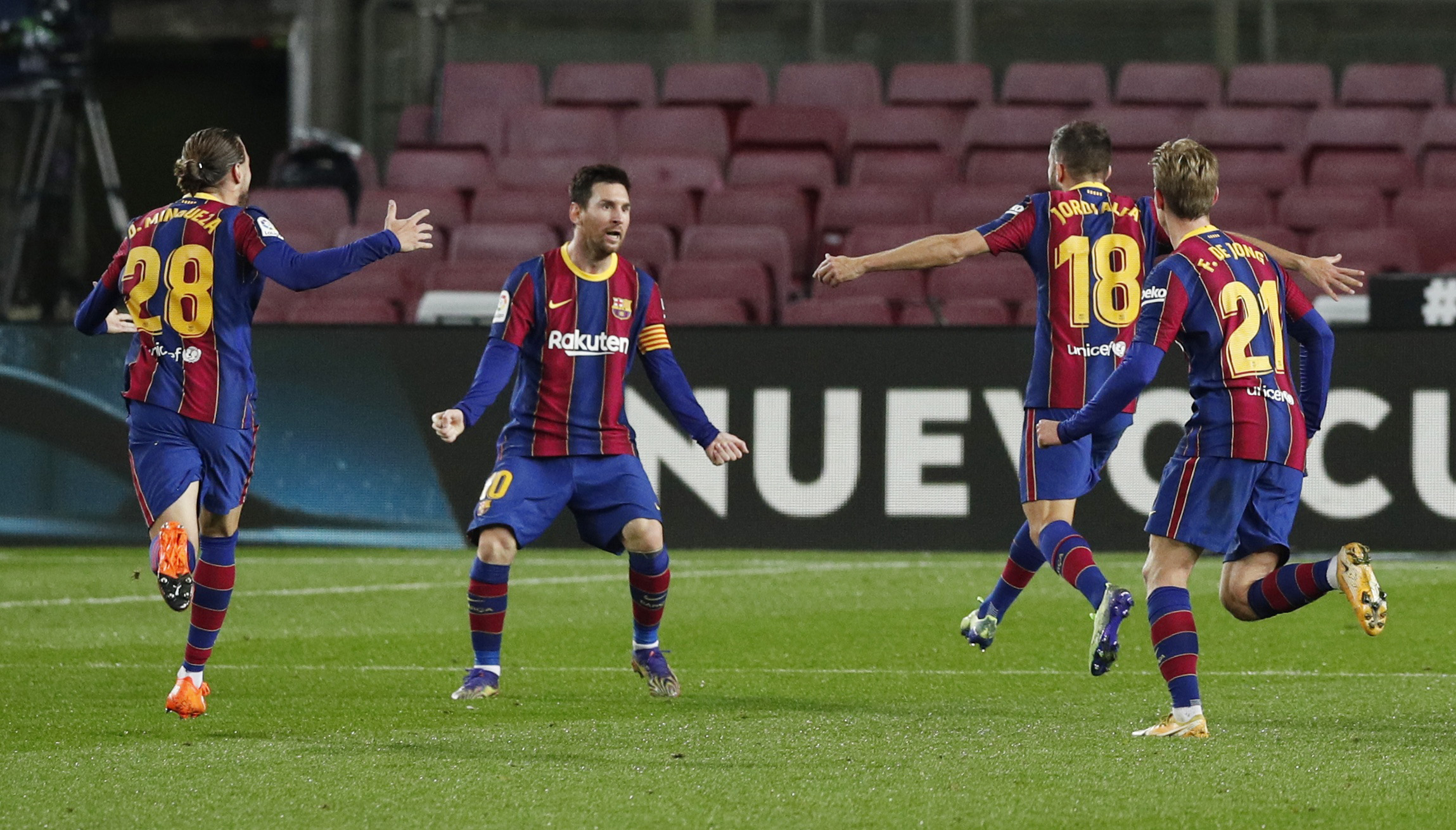 Soccer Football - La Liga Santander - FC Barcelona v Real Sociedad - Camp Nou, Barcelona, Spain - December 16, 2020 Barcelona's Jordi Alba celebrates scoring their first goal with Lionel Messi REUTERS