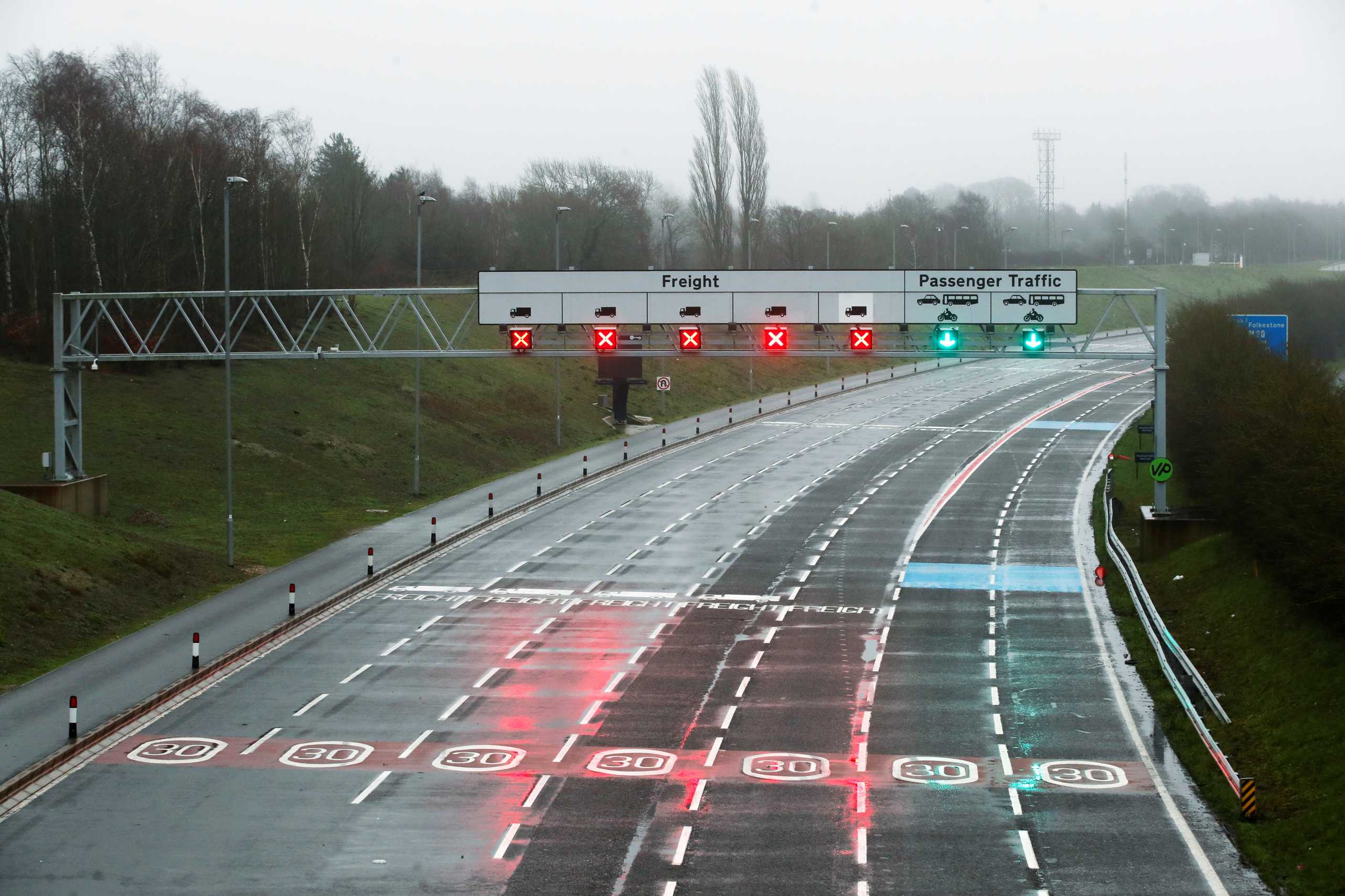 General view of empty roads at an Eurotunnel check-in, as EU countries impose a travel ban from the UK following the coronavirus disease (COVID-19) outbreak, in Folkestone, Britain, December 21, 2020. REUTERS