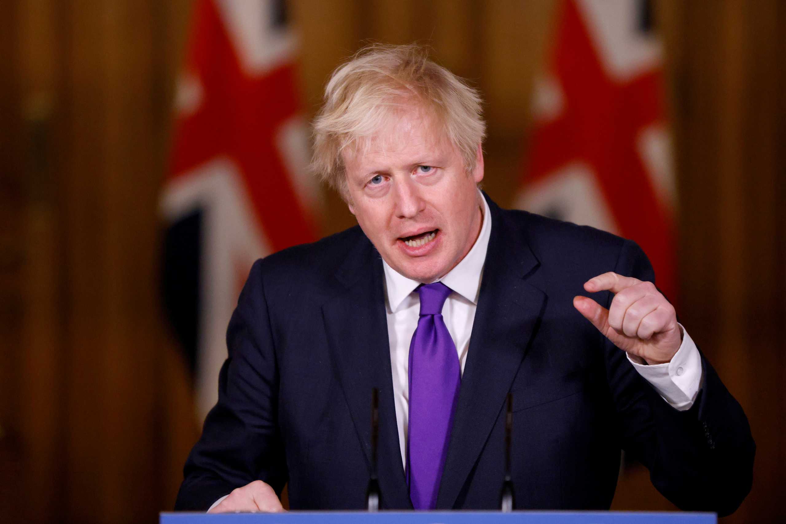 FILE PHOTO: Britain's Prime Minister Boris Johnson speaks during a news conference on the ongoing situation with the coronavirus disease (COVID-19), at Downing Street in London, Britain December 2, 2020. REUTERS