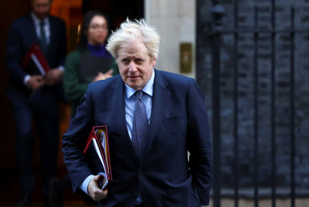 Britain's Prime Minister Boris Johnson arrives to attend a Cabinet meeting at the Foreign and Commonwealth Office (FCO) in London, Britain December 1, 2020. REUTERS