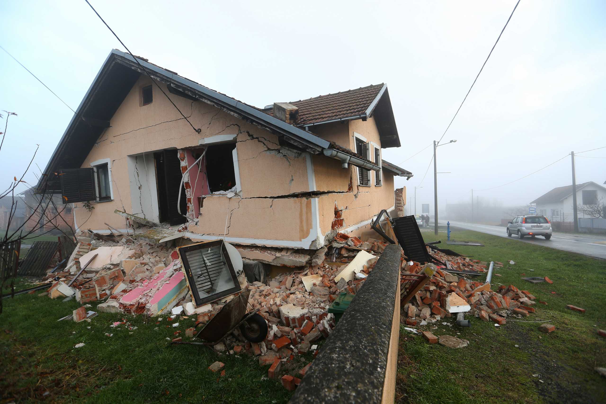 A damaged house is seen in Prokopa village after an earthquake in Croatia, December 30, 2020. REUTERS