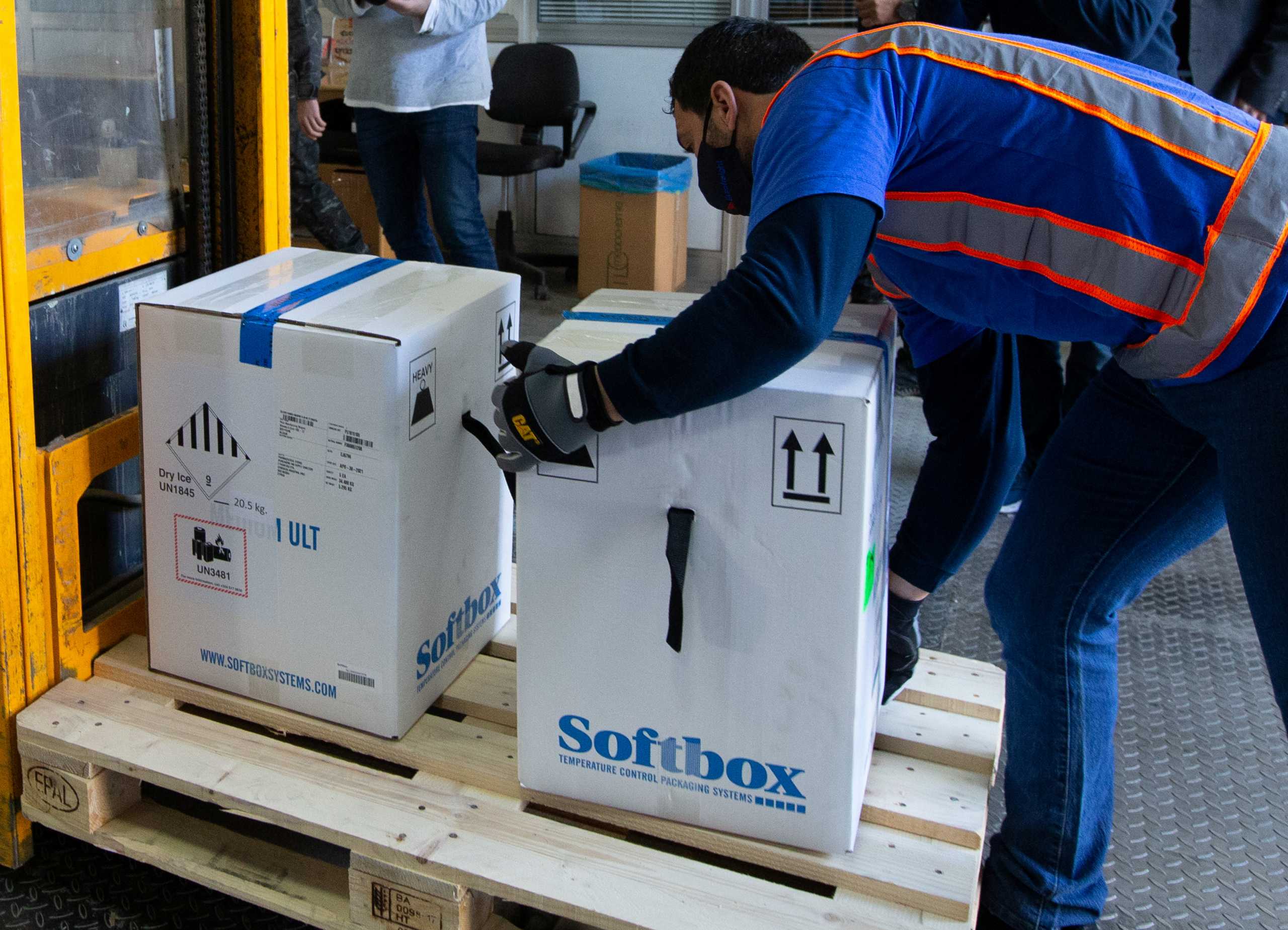 Boxes of Pfizer-BioNtech coronavirus disease (COVID-19) vaccines arrive at an undisclosed location in Nicosia, Cyprus December 26, 2020. Stavros Ioannides