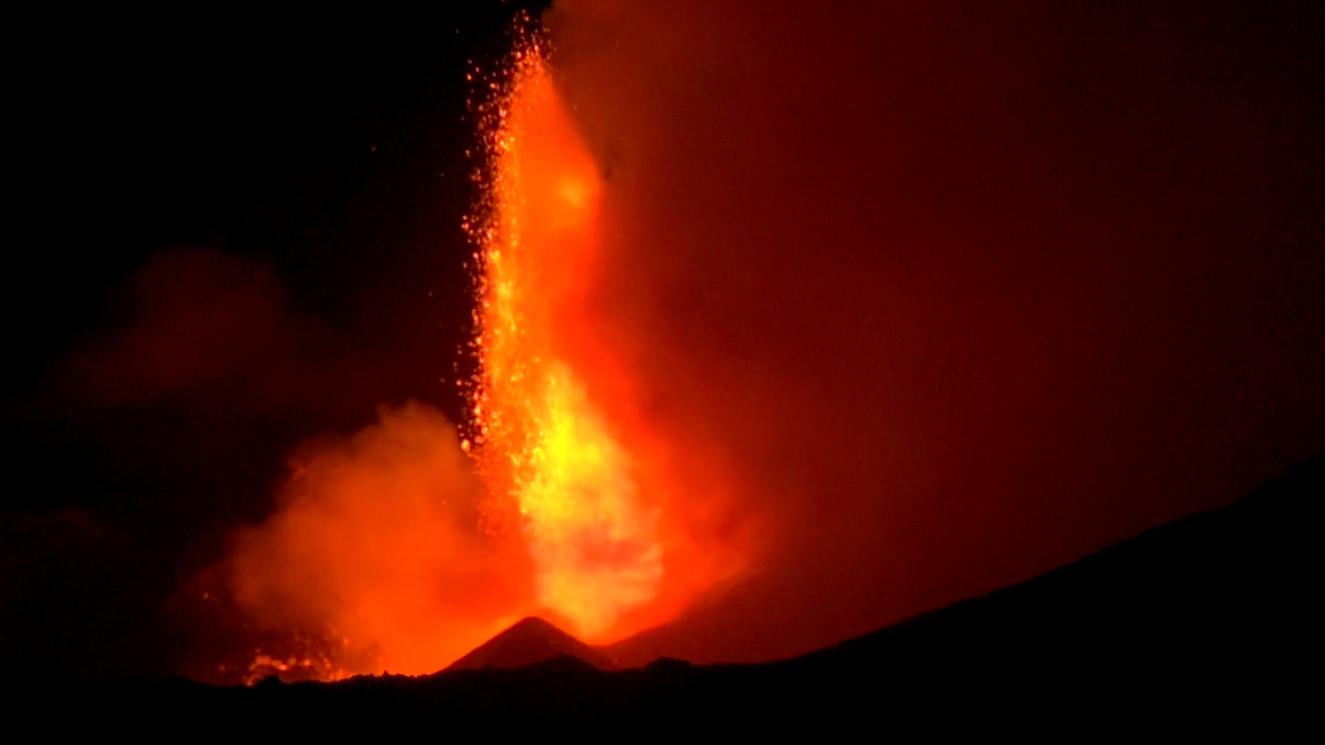 Spectacular eruptions from Mount Etna light up the sky during the night in this still image taken from video filmed in Nicolosi, Catania, Italy, December 14, 2020. Local Team
