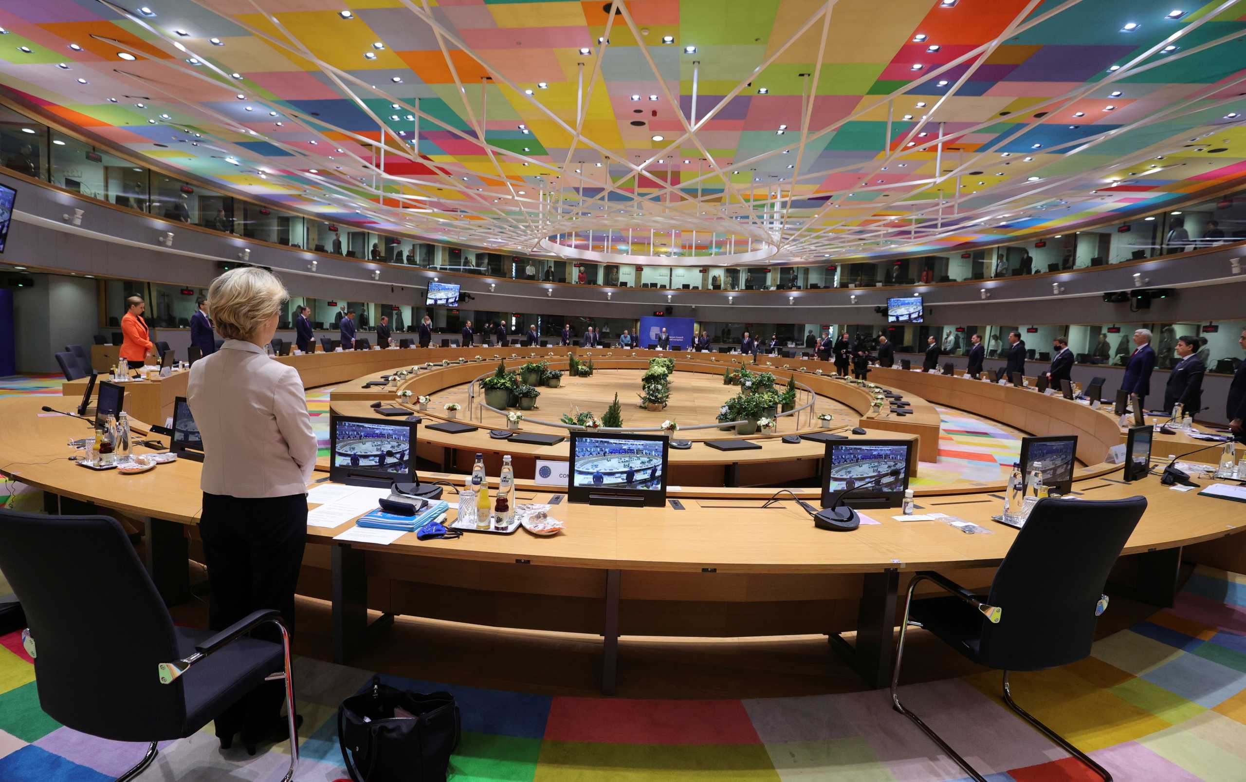 European Union heads of state stand for a moment to remember late French President Valery Giscard d'Estaing during a round table meeting at an EU summit at the European Council building in Brussels, Belgium December 10, 2020. Olivier Matthys