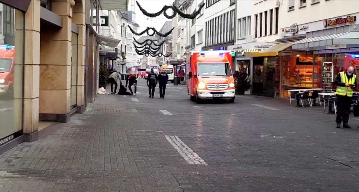 Police officers are seen at the city center, where a car crashed into pedestrians in Trier, Germany, December 1, 2020, in this still image obtained from a social media video. NEWSTR.DE