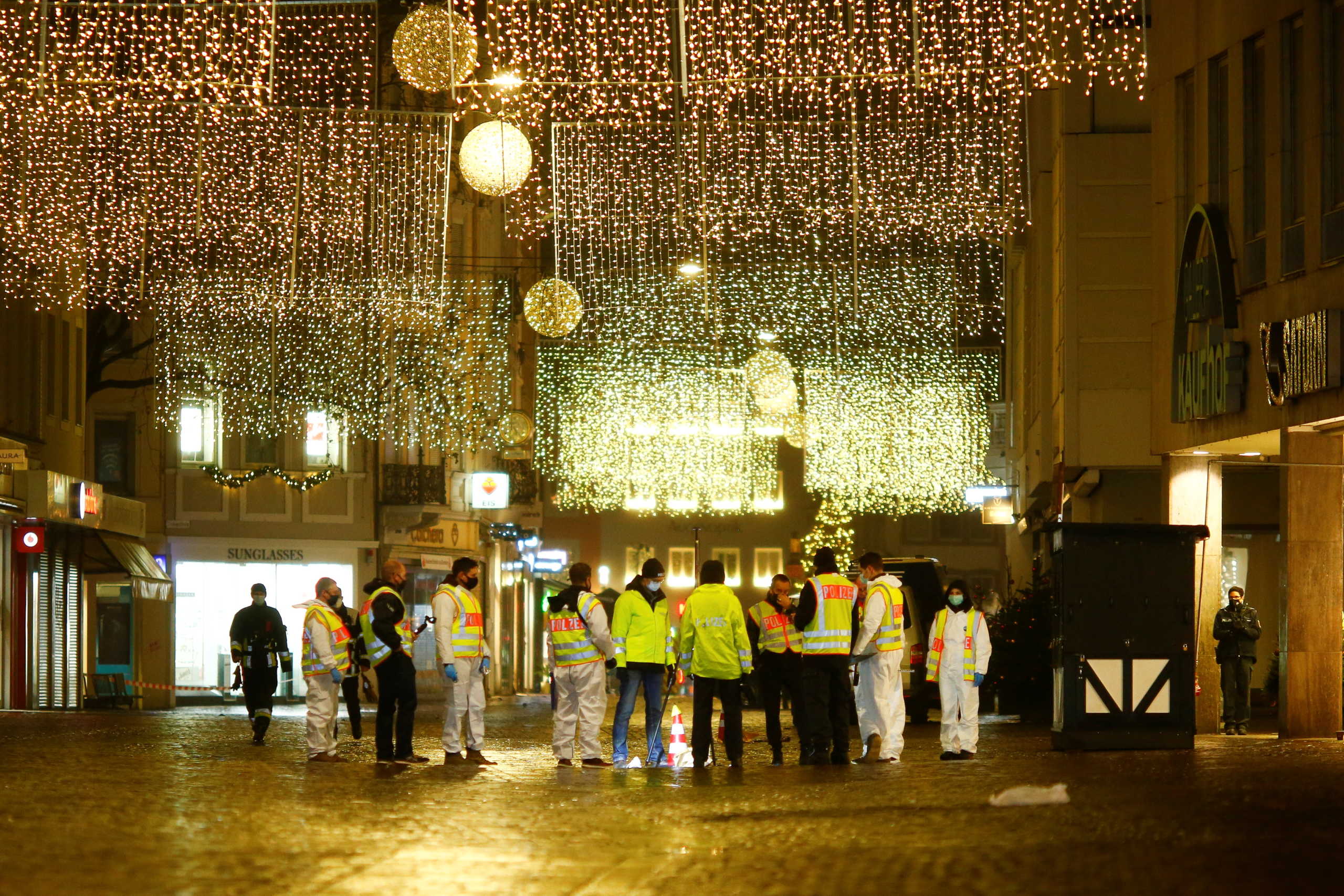 Police officers work at the city center, where a car crashed into pedestrians in Trier, Germany, December 1, 2020. REUTERS