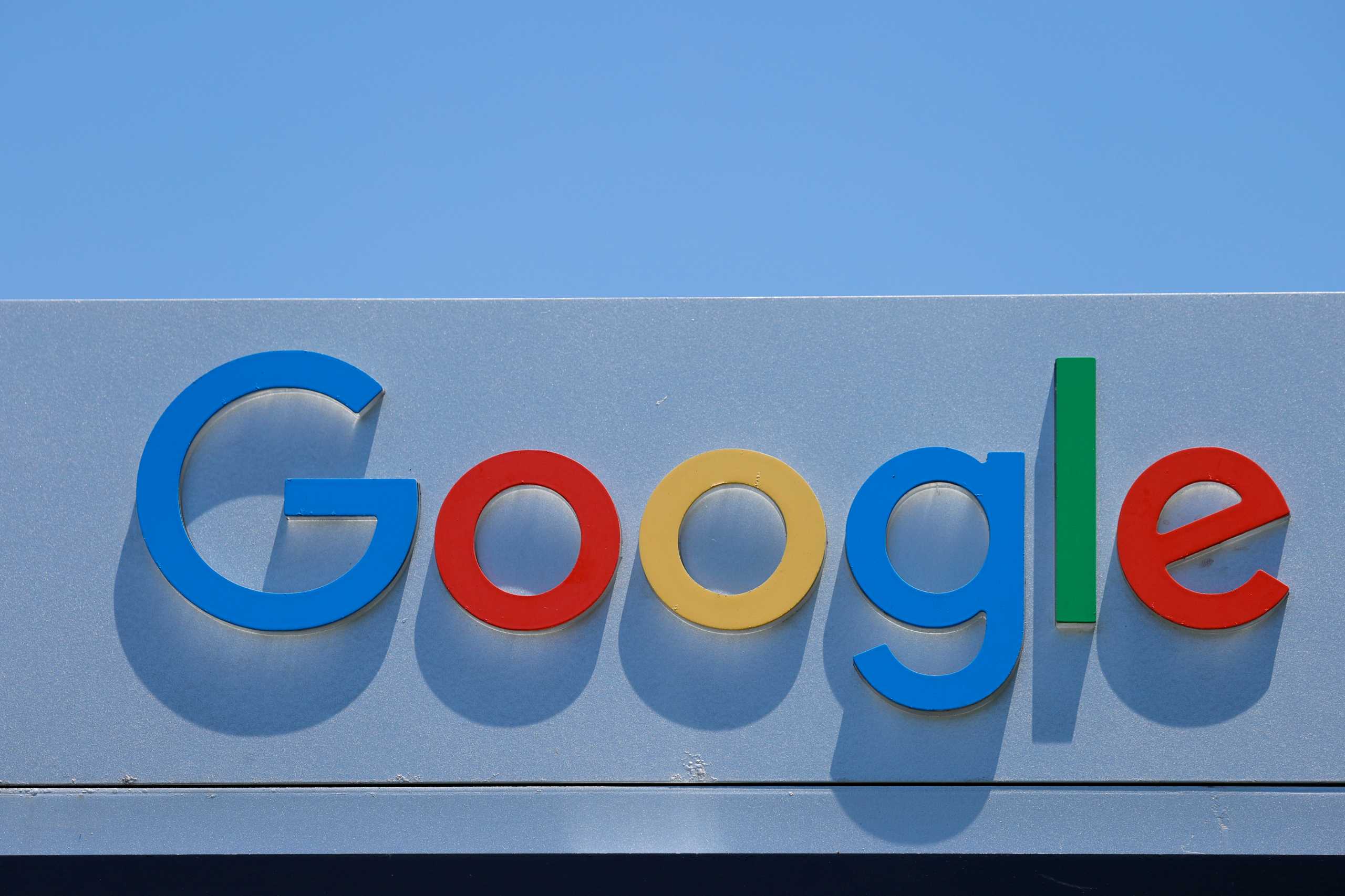 FILE PHOTO: After the company announced it would extend its coronavirus work-from-home order until summer 2021, a Google sign is shown at one of the company's office complexes in Irvine, California, U.S., July 27, 2020. REUTERS