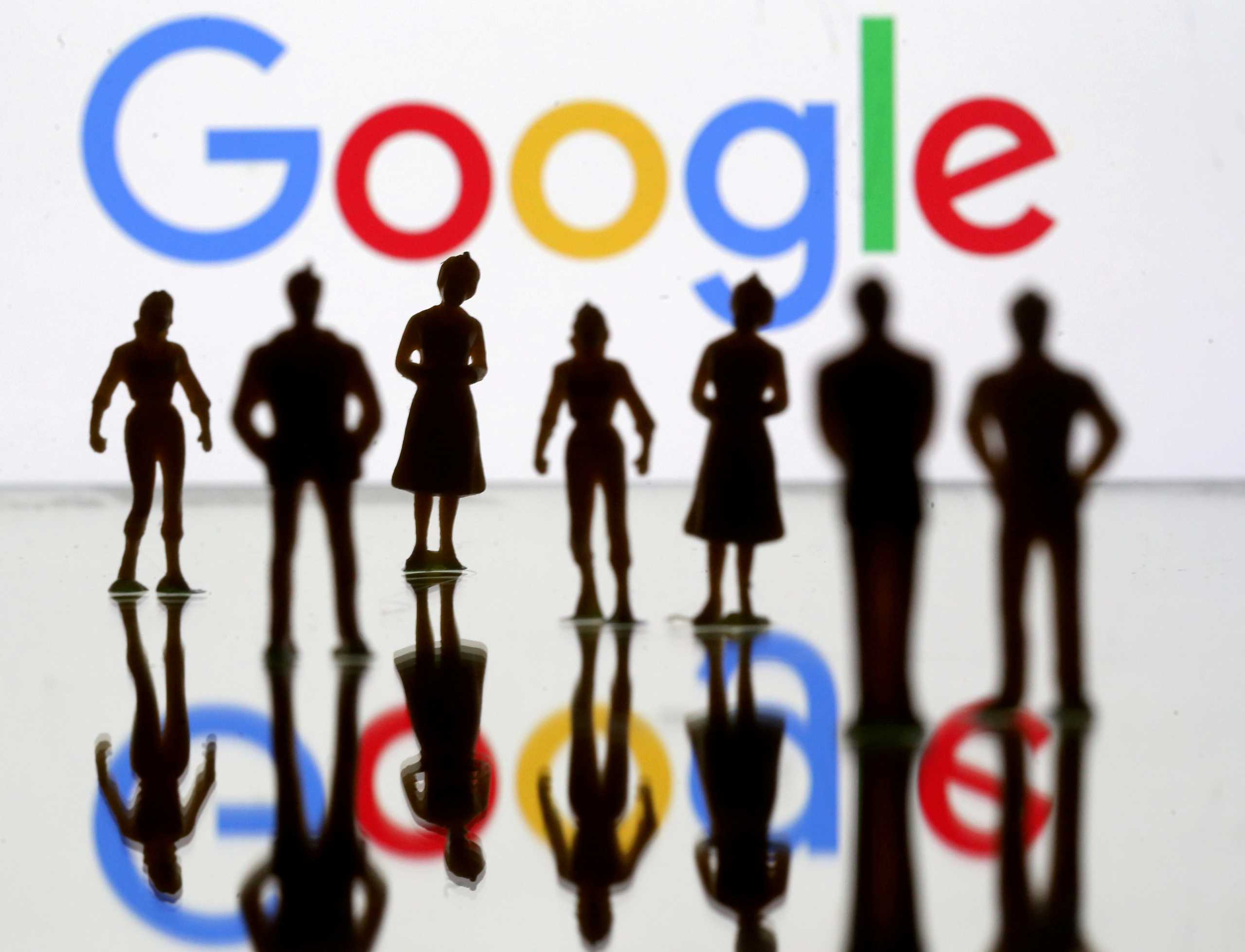 FILE PHOTO: Small toy figures are seen in front of Google logo in this illustration picture, April 8, 2019. REUTERS