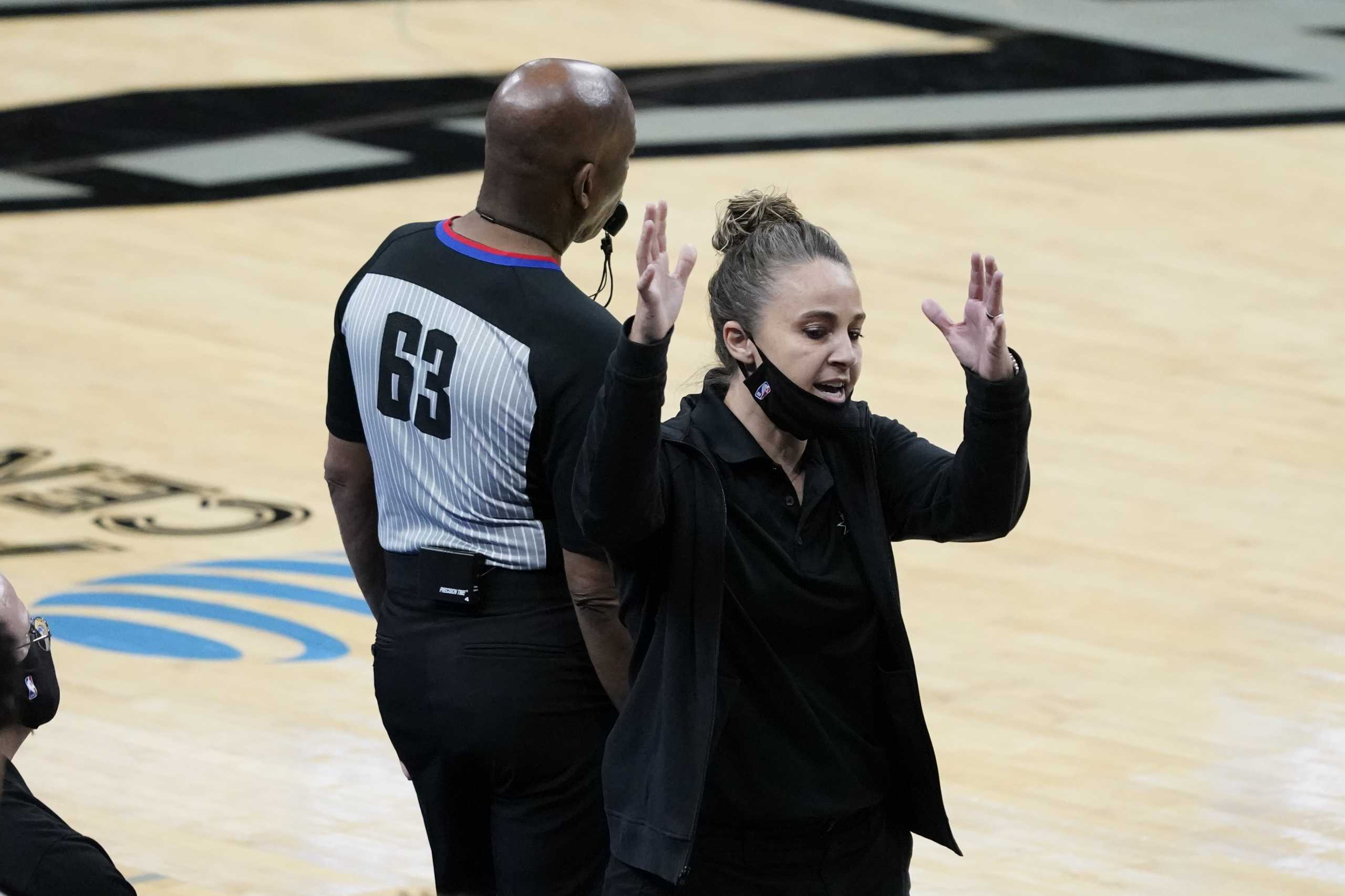 Dec 30, 2020; San Antonio, Texas, USA; San Antonio Spurs assistant coach Becky Hammon questions a call from official Derek Richardson (63) in the third quarter against the Los Angeles Lakers at AT&T Center. Mandatory Credit: Scott Wachter-USA TODAY Sports
