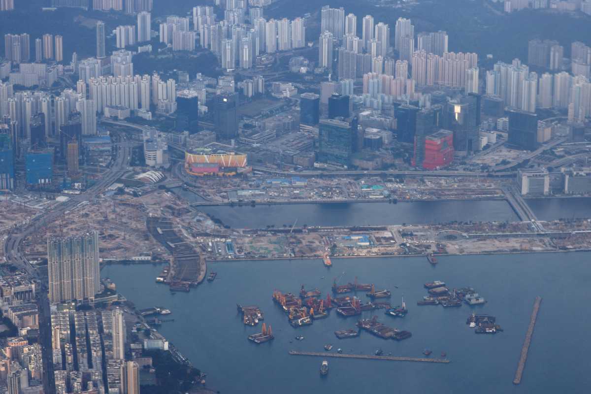 FILE PHOTO: Aerial view of residential housing seen through the window of an airplane in Hong Kong, China October 24, 2020. REUTERS