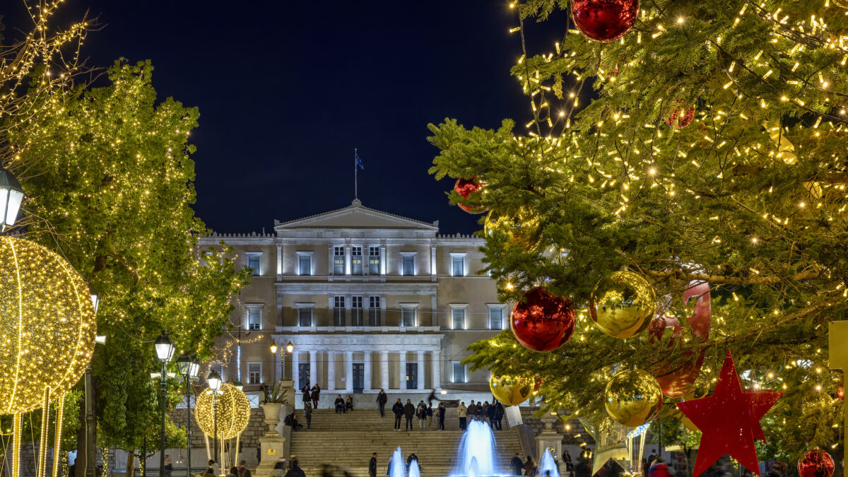 Athens, Greece - December 20th 2021: the christmas decorated Syntagma Square in front of the Greek Parliament in the City Centre
