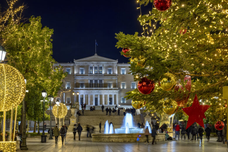 Athens, Greece - December 20th 2021: the christmas decorated Syntagma Square in front of the Greek Parliament in the City Centre
