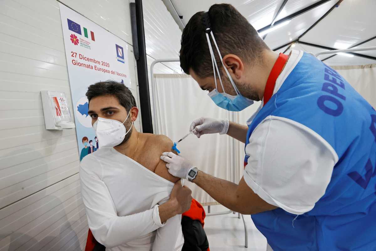 A man receives the Pfizer-BioNTech COVID-19 vaccine against the coronavirus disease at the Cardarelli hospital in Naples, Italy, December 27, 2020. REUTERS