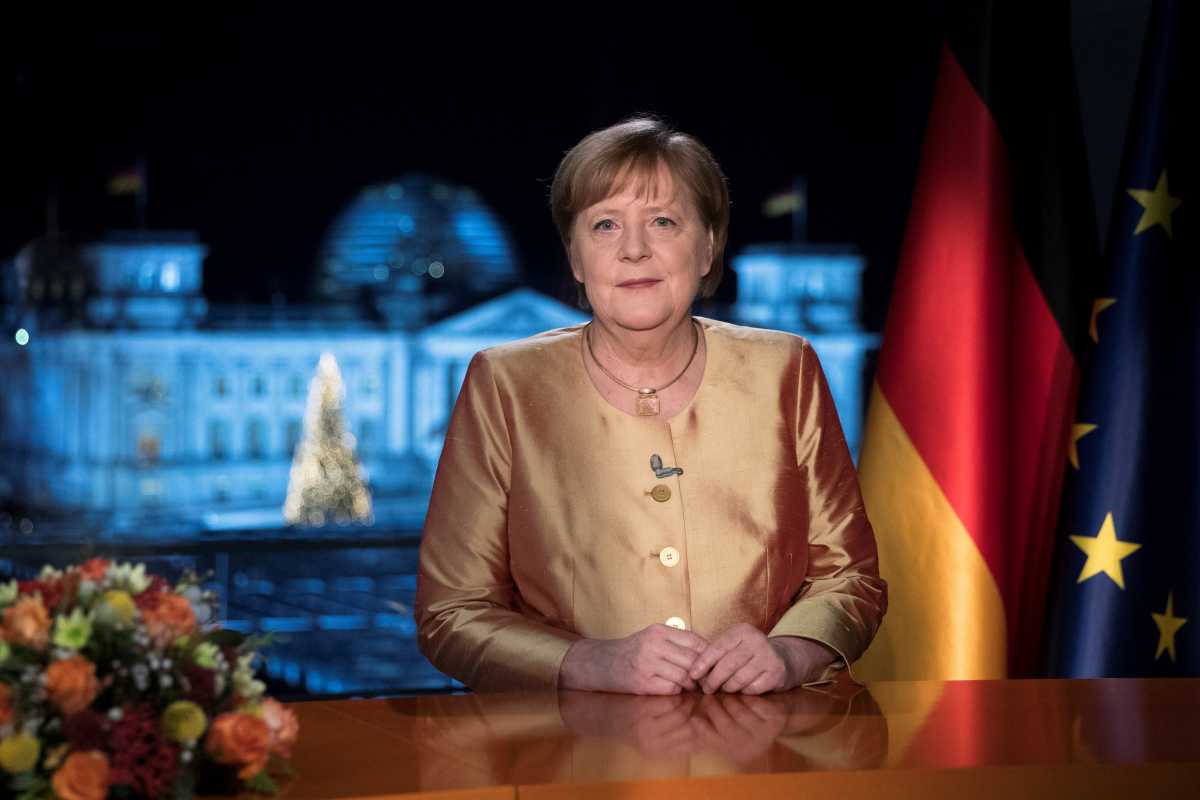 German Chancellor Angela Merkel poses for photographs after the television recording of her annual New Year's speech at the chancellery in Berlin, Germany December 30, 2020. Picture taken December 30, 2020.  Markus Schreiber