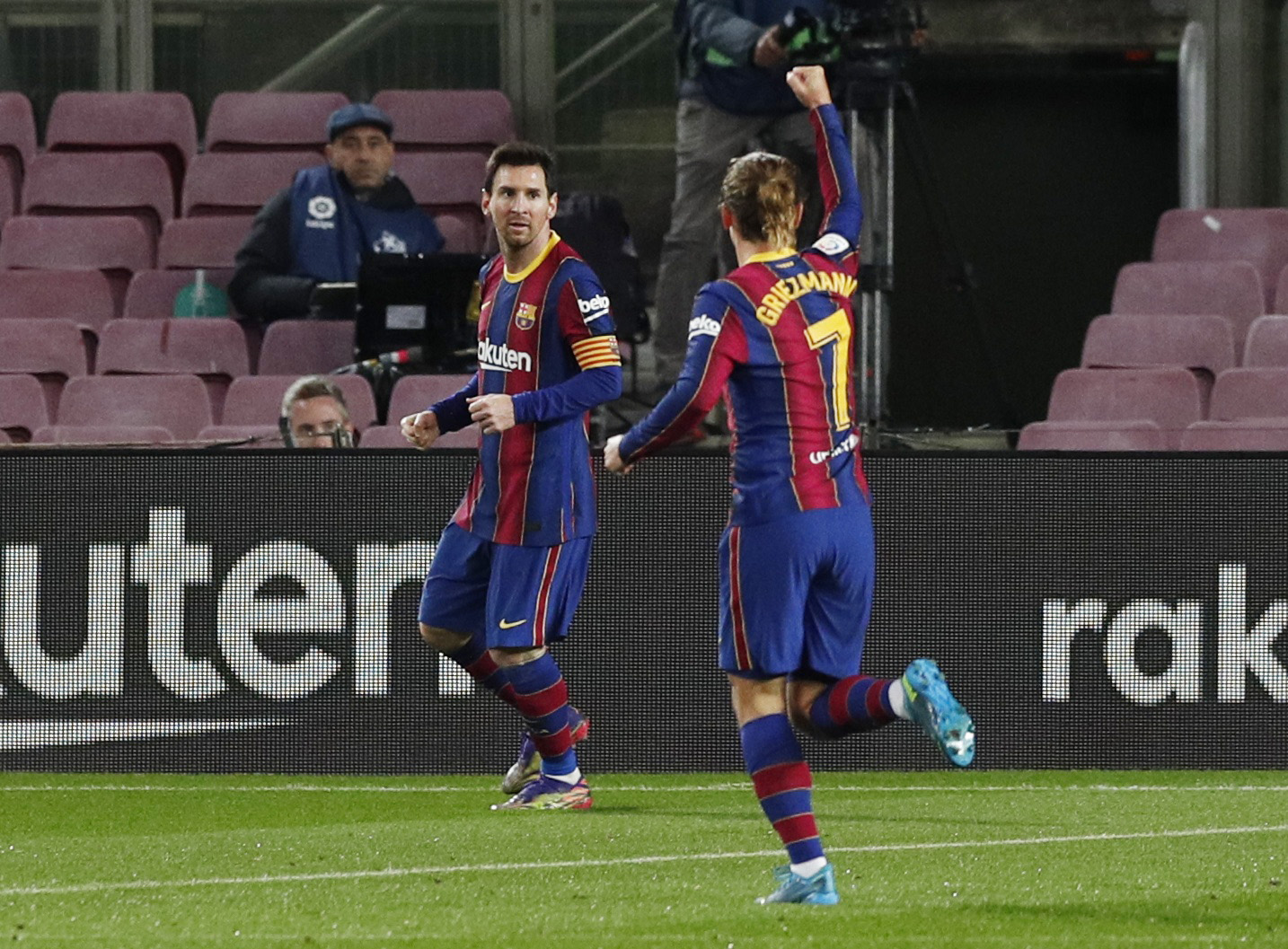 Soccer Football - La Liga Santander - FC Barcelona v Levante - Camp Nou, Barcelona, Spain - December 13, 2020 FC Barcelona's Lionel Messi celebrates scoring their first goal with Antoine Griezmann REUTERS