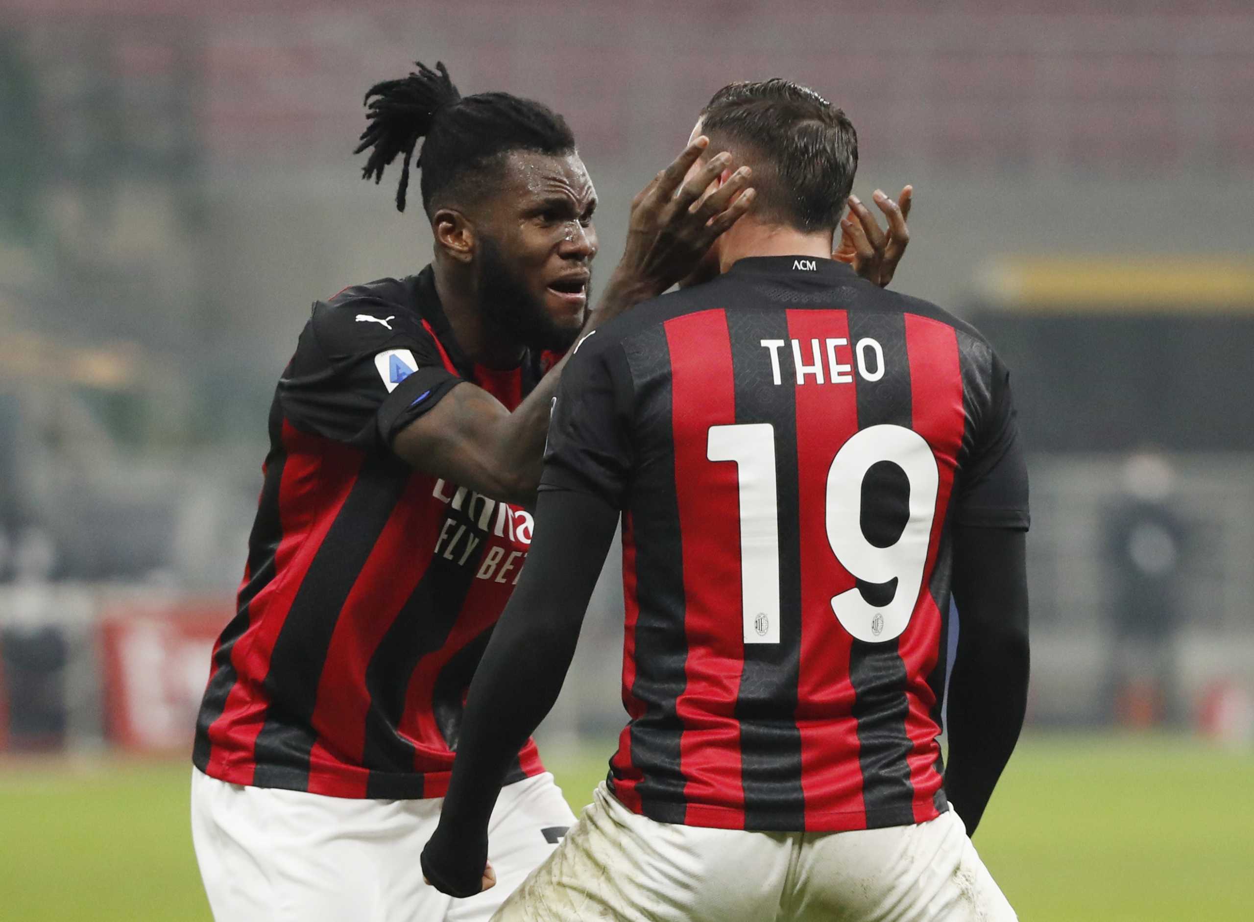 Soccer Football - Serie A - AC Milan v Parma - San Siro, Milan, Italy - December 13, 2020 AC Milan's Theo Hernandez celebrates scoring their second goal with Franck Kessie REUTERS