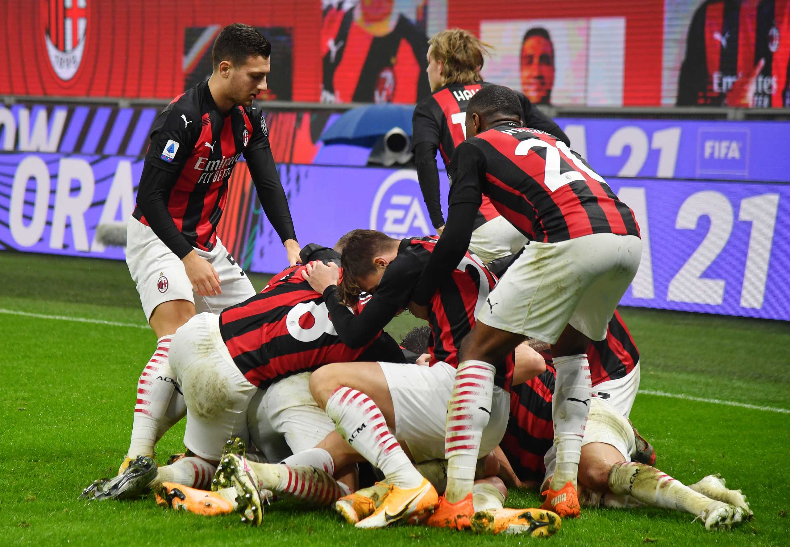 Soccer Football - Serie A - AC Milan v Lazio - San Siro, Milan, Italy - December 23, 2020 AC Milan's Theo Hernandez celebrates scoring their third goal with teammates REUTERS