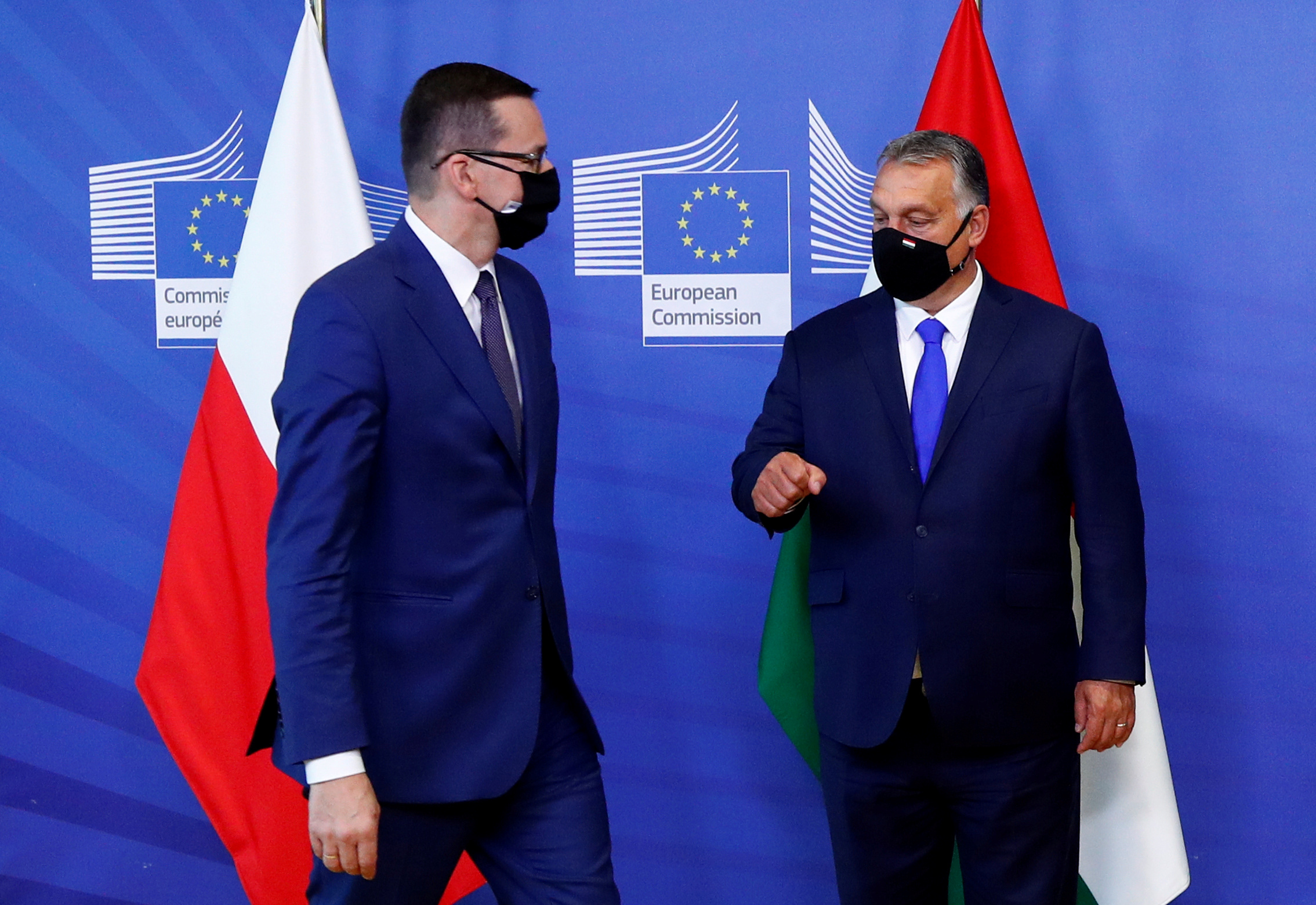FILE PHOTO: Poland's Prime Minister Mateusz Morawiecki and Hungary's Prime Minister Viktor Orban arrive ahead of a meeting with European Commission President Ursula von der Leyen in Brussels, Belgium September 24, 2020 REUTERS
