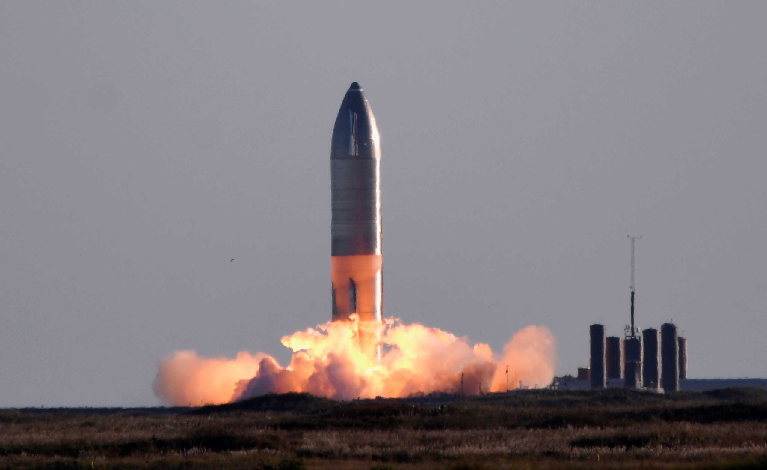SpaceX launches its first super heavy-lift Starship SN8 rocket during a test from their facility in Boca Chica,Texas, U.S. December 9, 2020. REUTERS