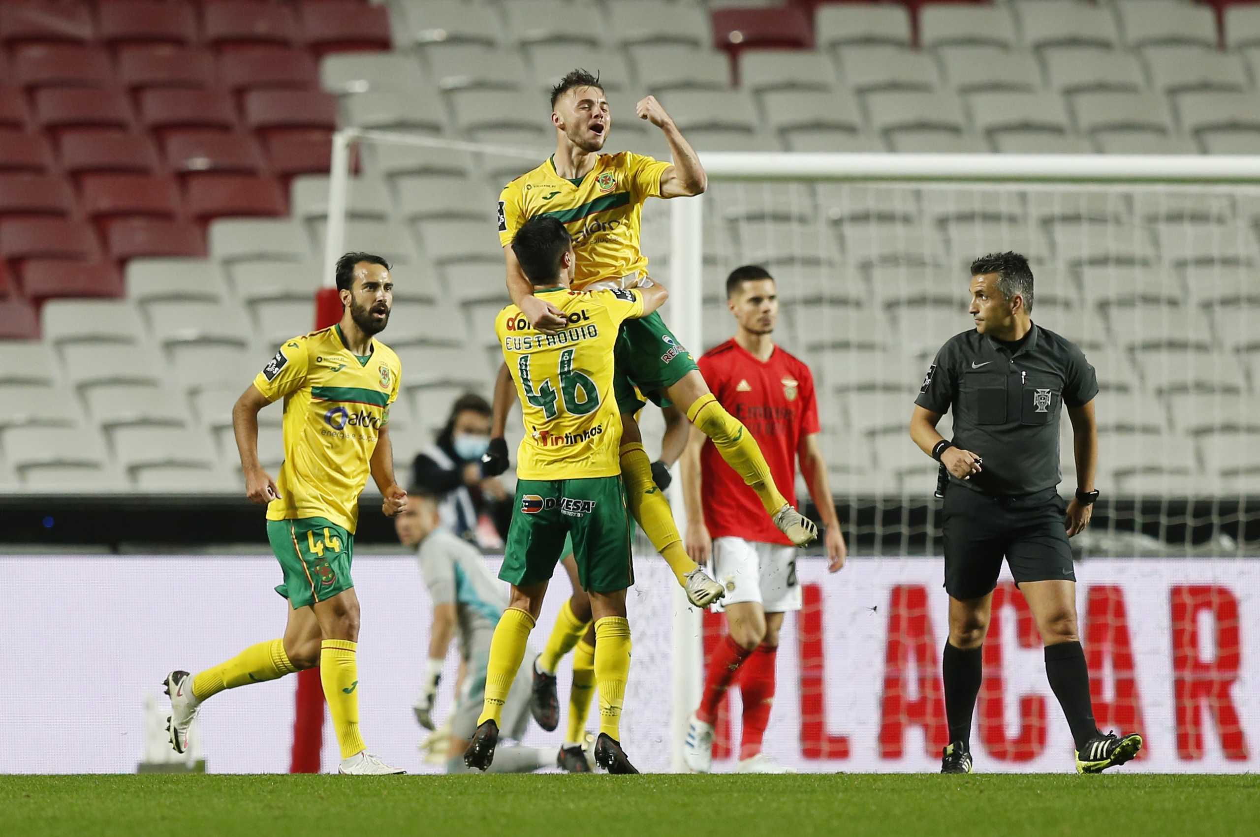 Soccer Football - Primeira Liga - Benfica v Pacos de Ferreira - Estadio da Luz, Lisbon, Portugal - December 6, 2020 Pacos de Ferreira's Oleg Reabciuk celebrates scoring their first goal with teammates REUTERS