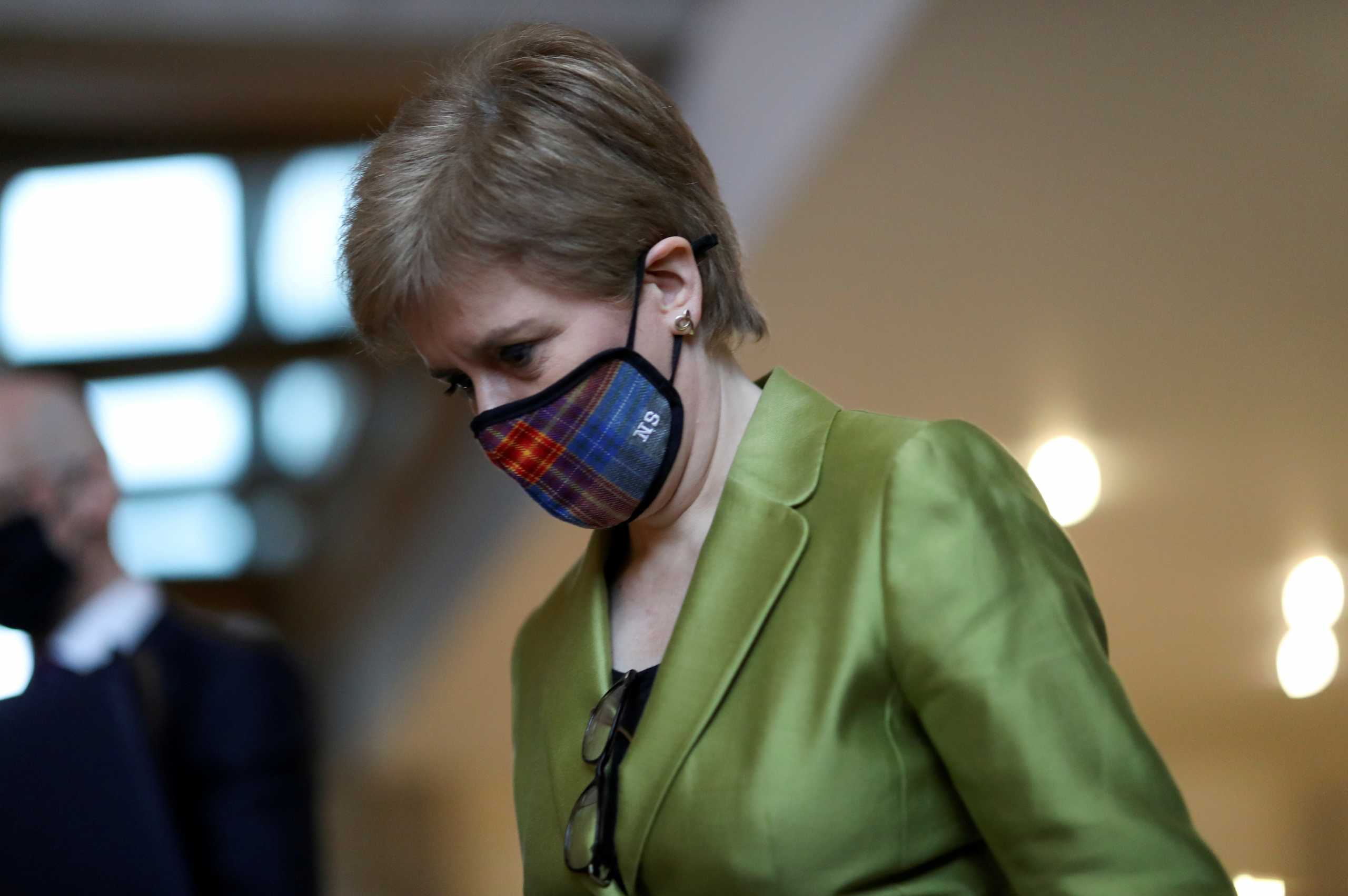 Scottish First Minister Nicola Sturgeon arrives for the First Minister's Questions at the parliament in Edinburgh, Scotland, Britain December 10, 2020. REUTERS