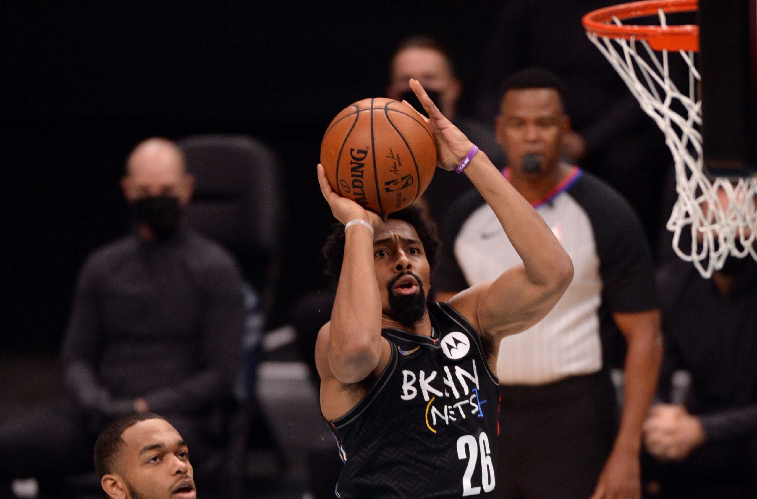 Dec 27, 2020; Charlotte, North Carolina, USA;  Brooklyn Nets guard Spencer Dinwiddie (26) shoots during the first half against the Charlotte Hornets at the Spectrum Center. Mandatory Credit: Sam Sharpe-USA TODAY Sports