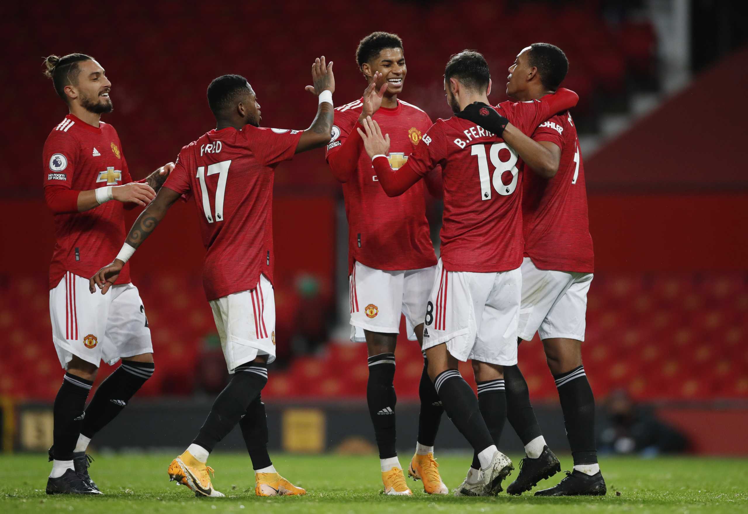Soccer Football - Premier League - Manchester United v Leeds United - Old Trafford, Manchester, Britain - December 20, 2020 Manchester United's Bruno Fernandes celebrates scoring their sixth goal with teammates Pool via REUTERS