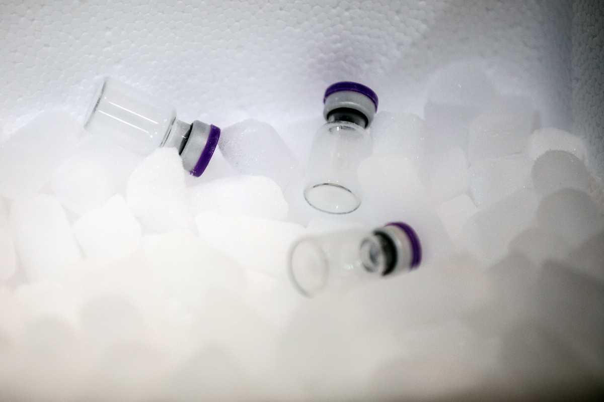Empty phials are pictured in dry ice in a warehouse which will be used as a logistic hub for COVID-19 vaccine distribution, in the Paris' suburban city of Chanteloup-en-Brie, France December 22, 2020, a day after the European Union gives the green light for the Pfizer-BioNTech coronavirus vaccine, paving the way for vaccinations to finally start in the 27-nation bloc on December 27. Geoffroy Van Der Hasselt