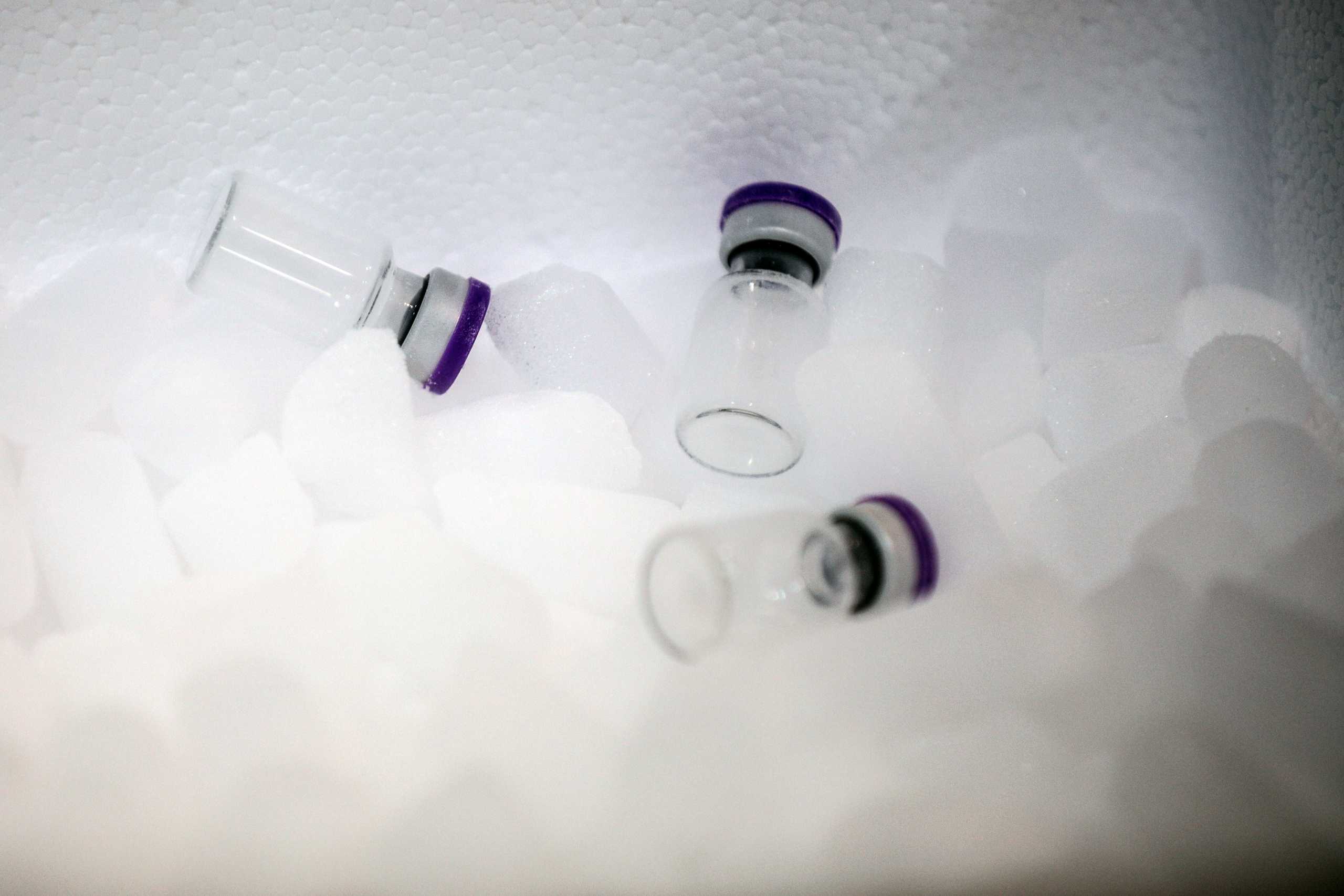 Empty phials are pictured in dry ice in a warehouse which will be used as a logistic hub for COVID-19 vaccine distribution, in the Paris' suburban city of Chanteloup-en-Brie, France December 22, 2020, a day after the European Union gives the green light for the Pfizer-BioNTech coronavirus vaccine, paving the way for vaccinations to finally start in the 27-nation bloc on December 27. Geoffroy Van Der Hasselt