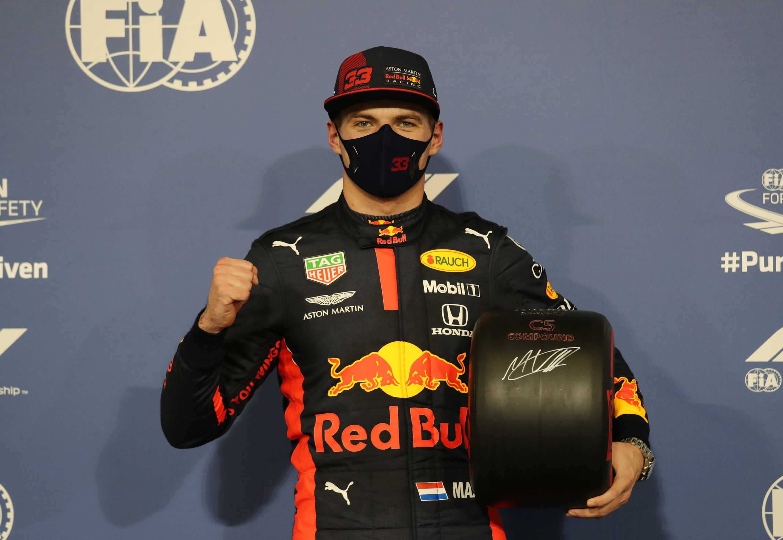 Formula One F1 - Abu Dhabi Grand Prix - Yas Marina Circuit, Abu Dhabi, United Arab Emirates - December 12, 2020 Red Bull's Max Verstappen poses with a wheel as he celebrates after qualifying in pole position Pool via REUTERS