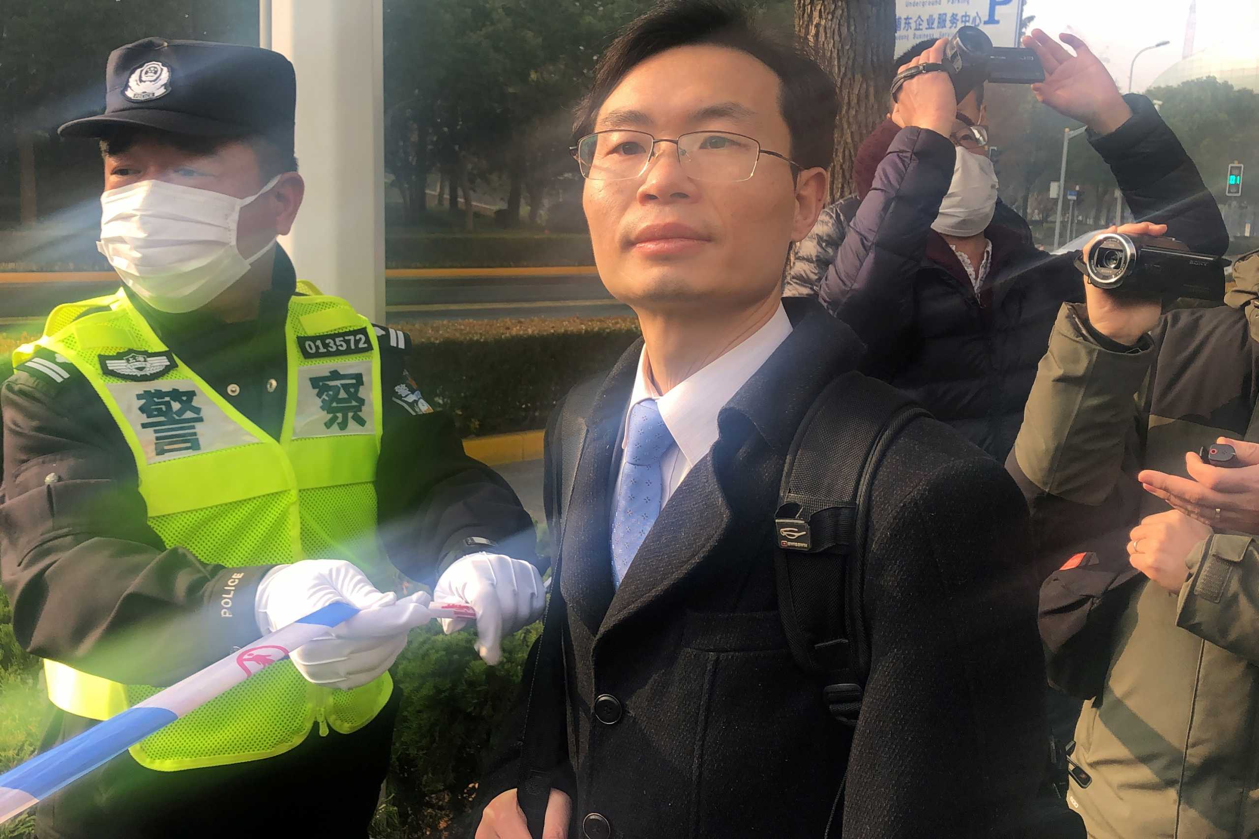 Lawyer Zhang Keke arrives to Shanghai Pudong New Area People's Court before the trial of citizen-journalist Zhang Zhan, who reported from Wuhan during the peak of the coronavirus disease (COVID-19) outbreak, in Shanghai, China December 28, 2020. REUTERS