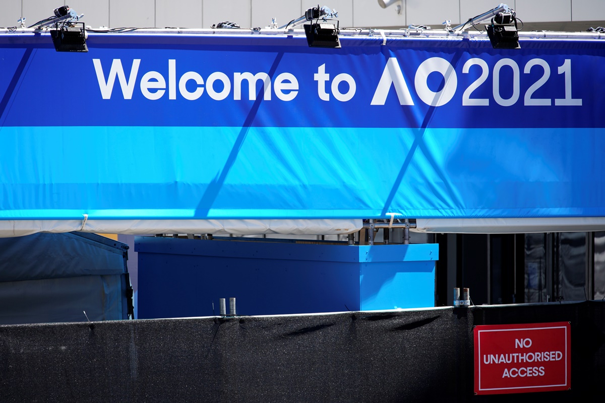 A sign is seen at the entrance to the Australian Open training grounds in Melbourne, Australia, January 20, 2021.  REUTERS