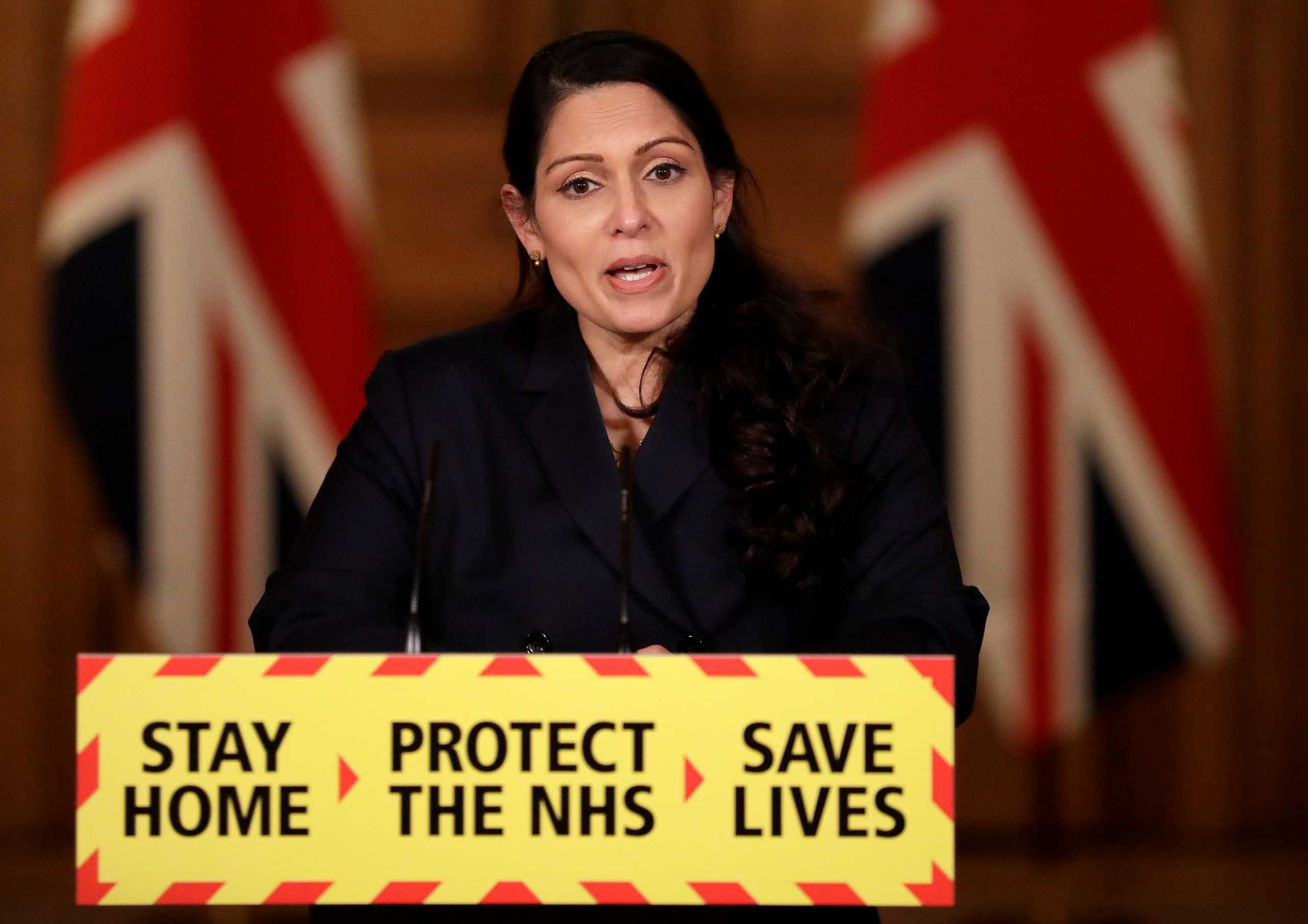 Britain's Home Secretary Priti Patel speaks during a news conference about the ongoing situation with the coronavirus disease (COVID-19) pandemic, inside 10 Downing Street, in London, Britain January 21, 2021. Matt Dunham