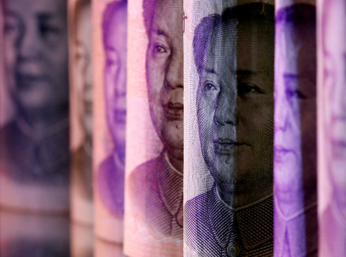 FILE PHOTO: Chinese Yuan banknotes are seen in this illustration taken February 10, 2020. REUTERS