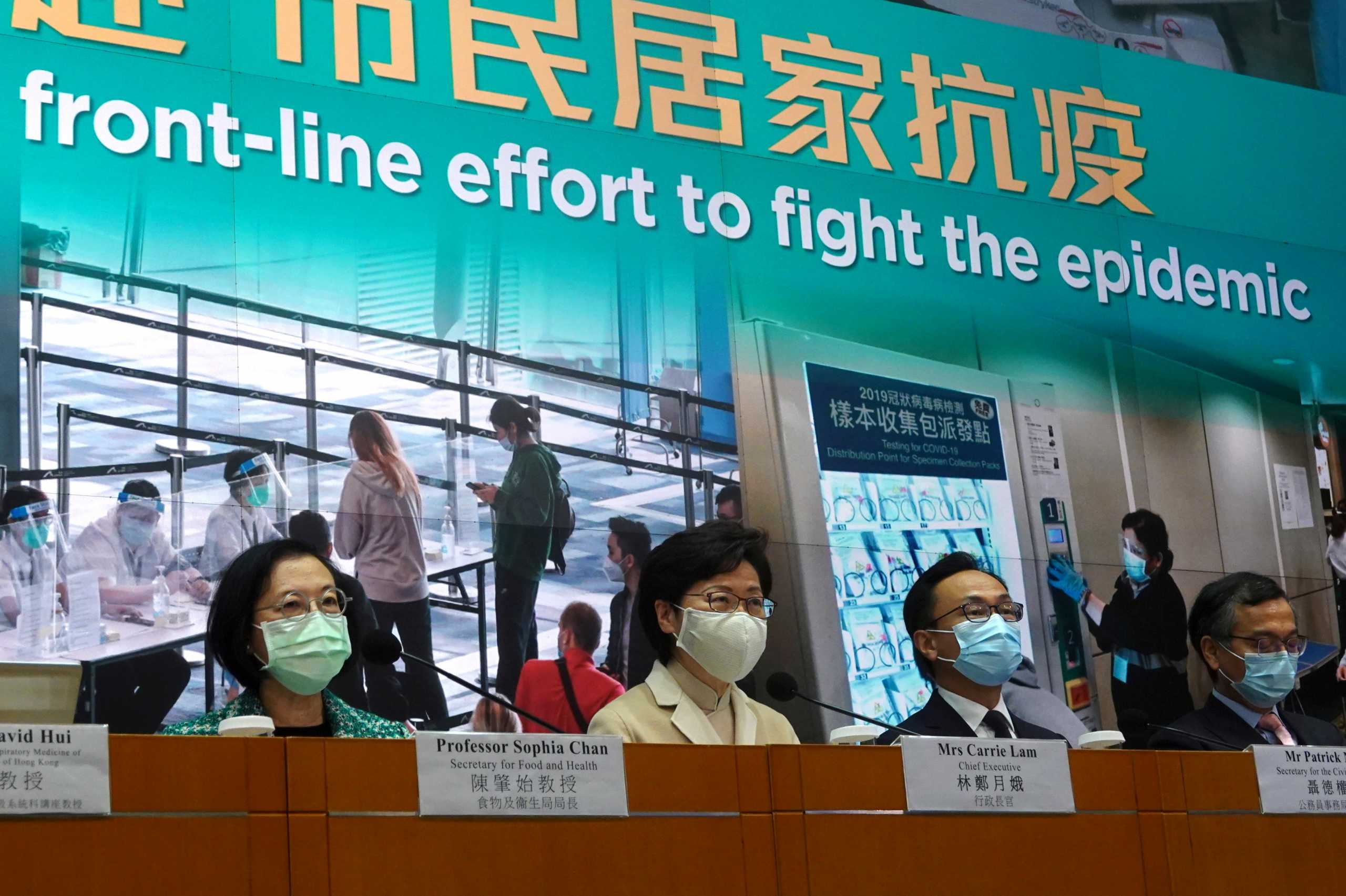 Hong Kong Chief Executive Carrie Lam wearing a mask attends a news conference on government's strategy for COVID-19 vaccinations, in Hong Kong, China December 23, 2020. REUTERS