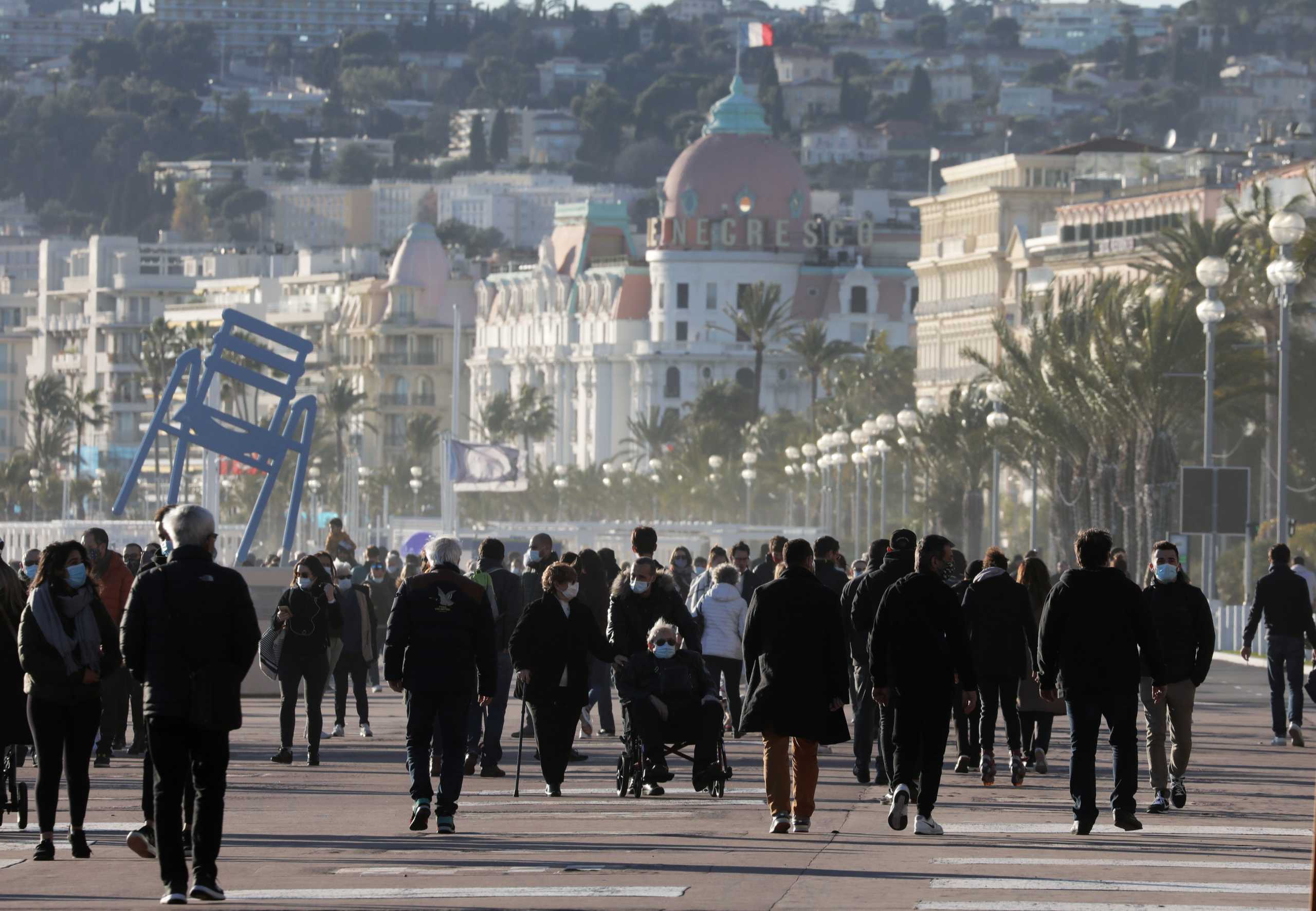 People enjoy a sunny weather on the Promenade des Anglais in Nice amid the coronavirus disease (COVID-19) outbreak in France, January 24, 2021.   REUTERS
