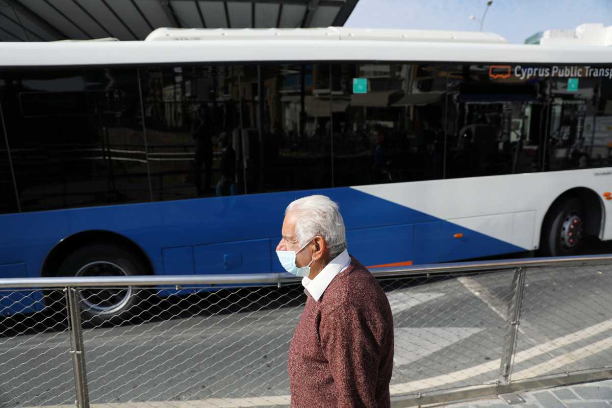 A man wearing a protective masks walks, amid the coronavirus disease (COVID-19) pandemic in Nicosia, Cyprus January 8, 2021. REUTERS