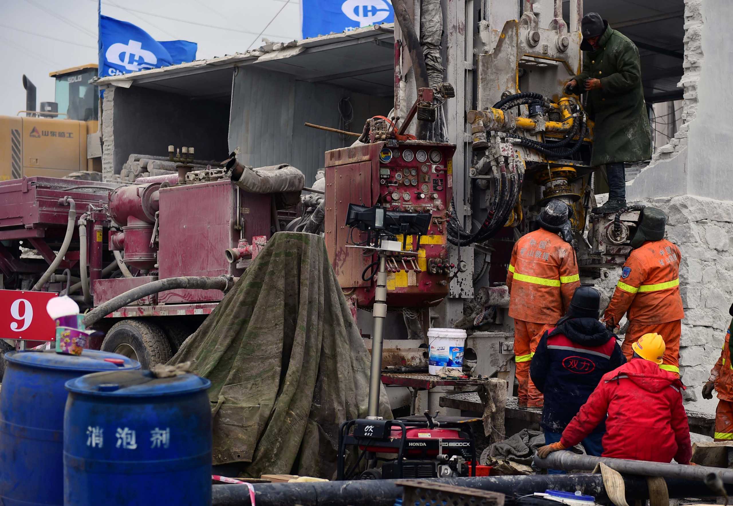 Rescuers work on saving workers trapped underground after the January 10 explosion at the Hushan gold mine in Qixia, Shandong province, China January 20, 2021. Picture taken January 20, 2021. cnsphoto via REUTERS ATTENTION EDITORS - THIS IMAGE WAS PROVIDED BY A THIRD PARTY. CHINA OUT.