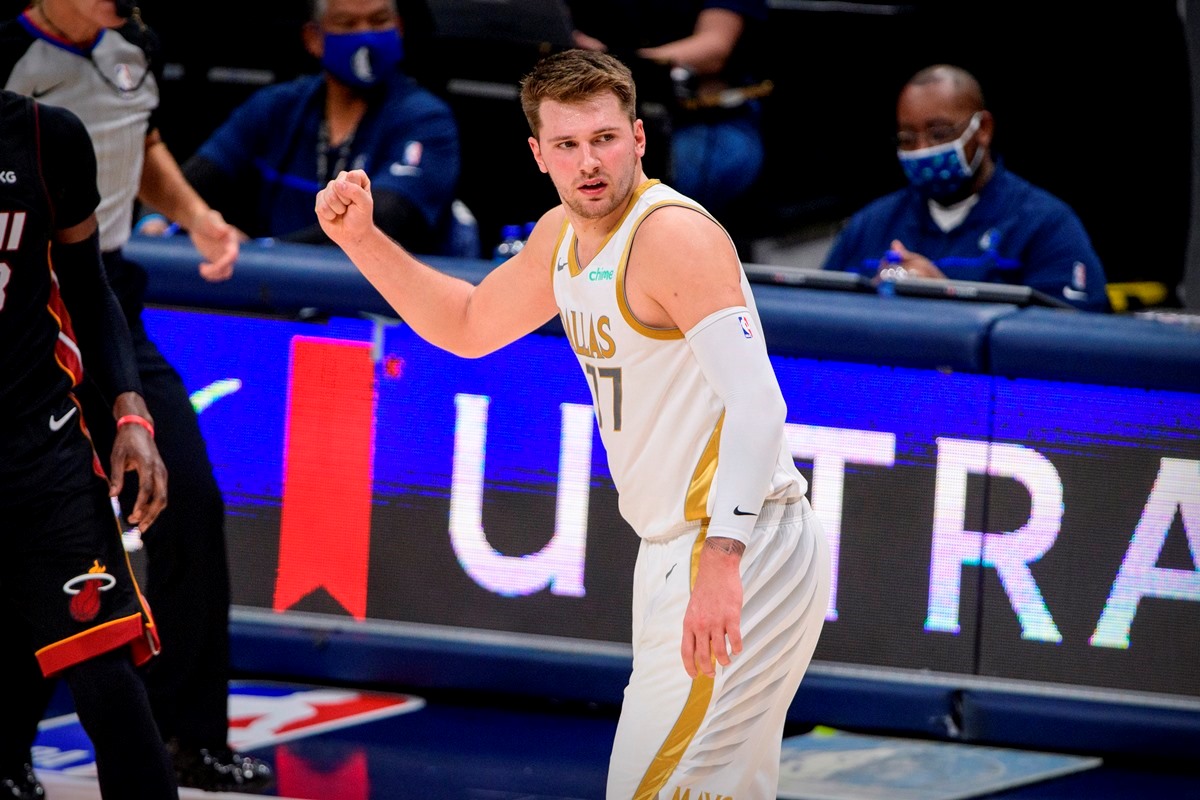 Jan 1, 2021; Dallas, Texas, USA; Dallas Mavericks guard Luka Doncic (77) celebrates during the second quarter against the Miami Heat at the American Airlines Center. Mandatory Credit: Jerome Miron-USA TODAY Sports