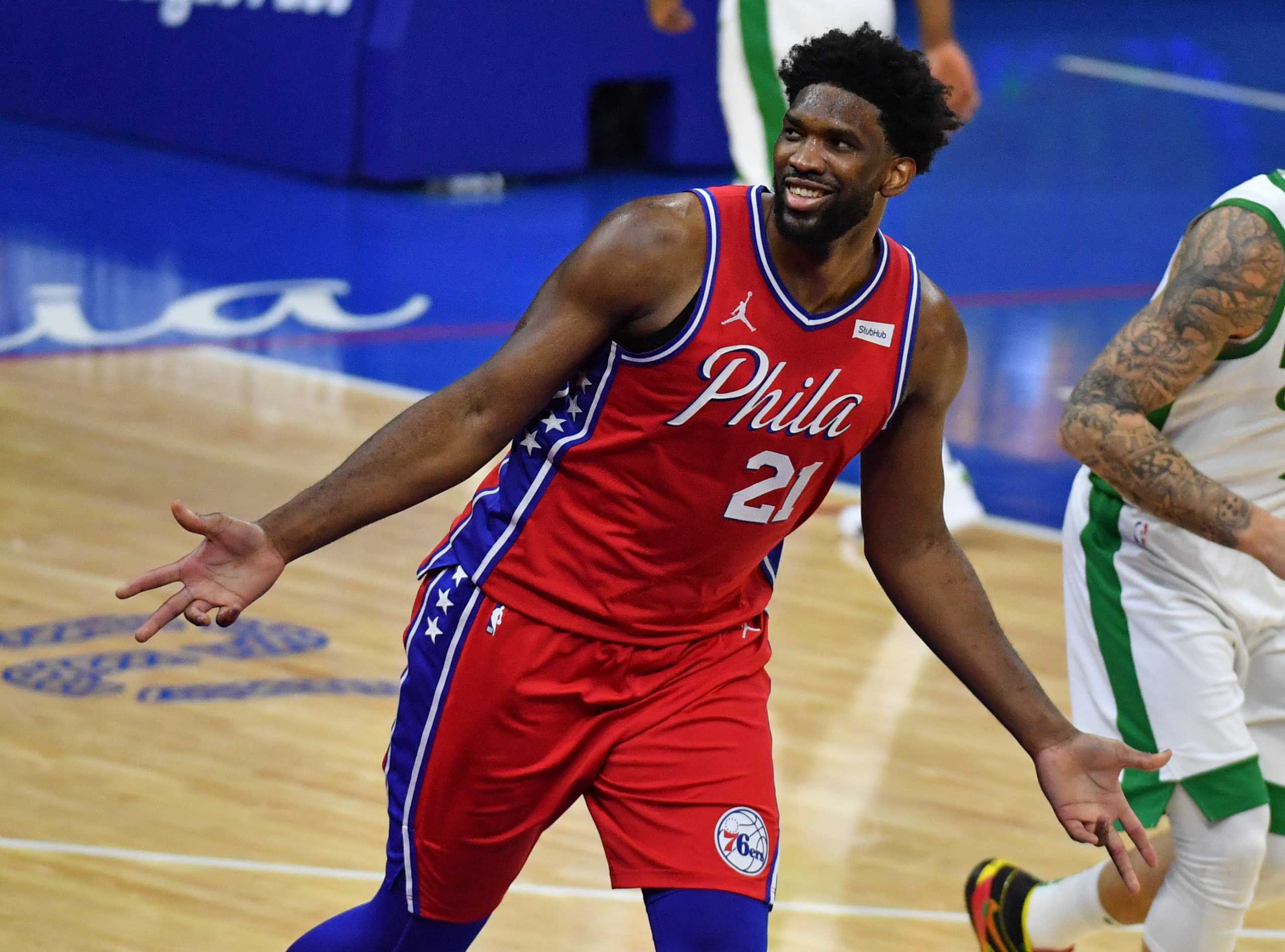Jan 22, 2021; Philadelphia, Pennsylvania, USA; Philadelphia 76ers center Joel Embiid (21) celebrates after making a three point shot against the Boston Celtics during the fourth quarter at Wells Fargo Center. Mandatory Credit: Eric Hartline-USA TODAY Sports
