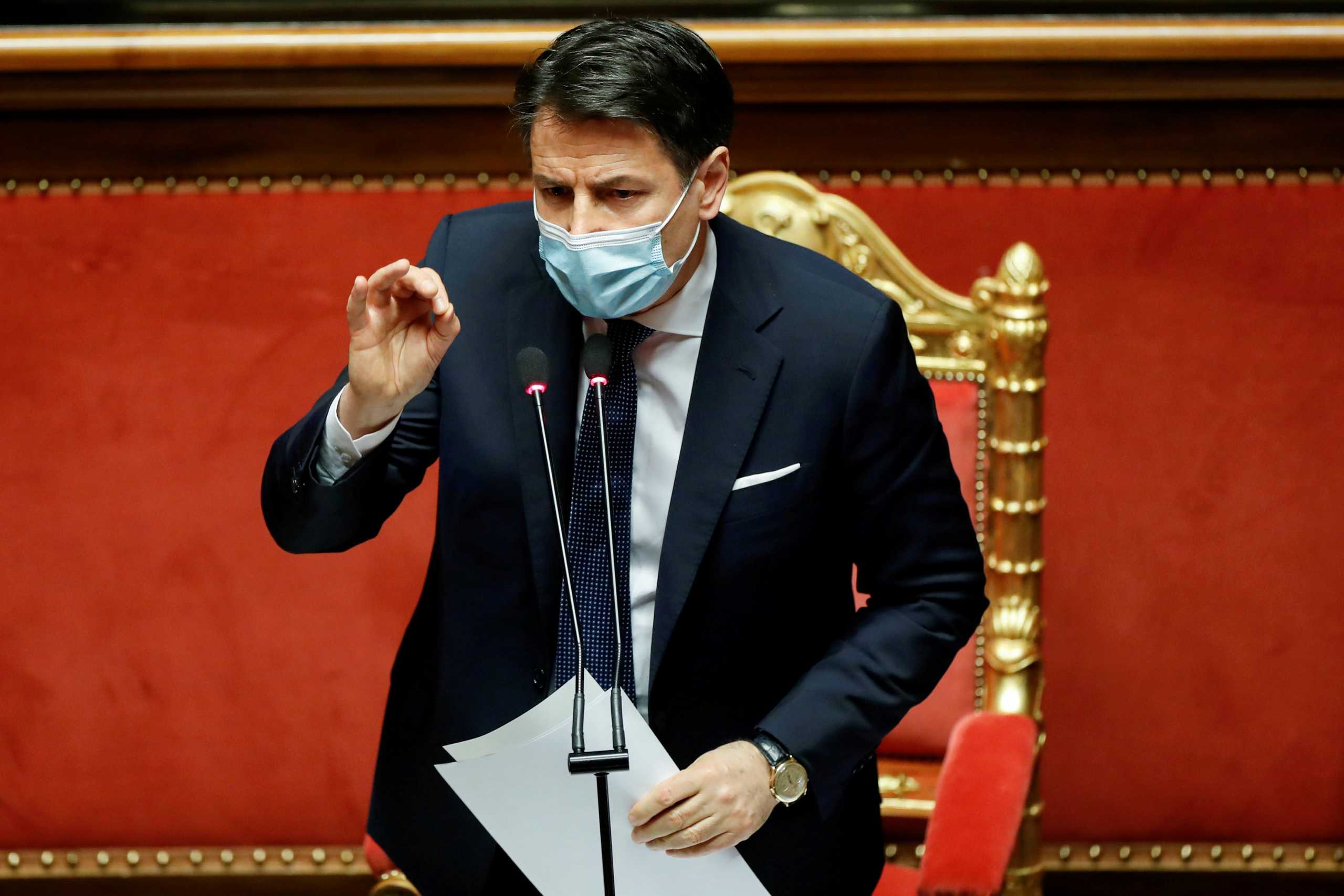 FILE PHOTO: Italian Prime Minister Giuseppe Conte gestures as he speaks ahead of a confidence vote at the upper house of parliament after former Prime Minister Matteo Renzi pulled his party out of government, in Rome, Italy, January 19, 2021. REUTERS