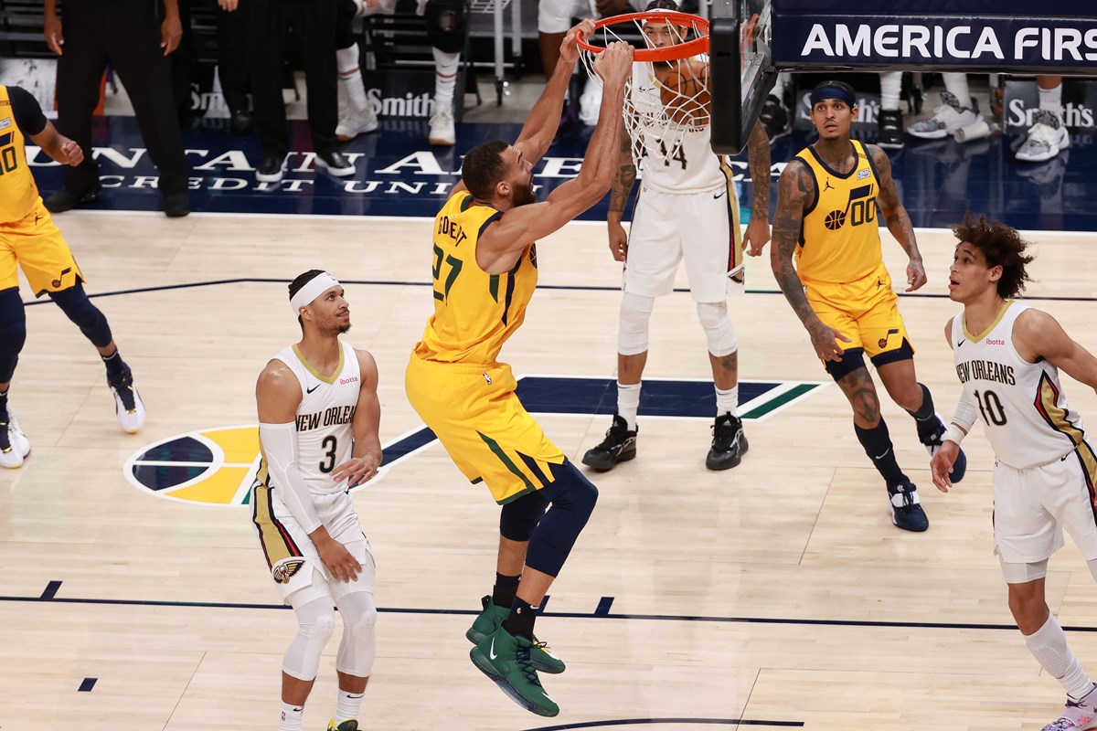 Jan 19, 2021; Salt Lake City, Utah, USA; Utah Jazz center Rudy Gobert (27) dunks the ball as New Orleans Pelicans guard Josh Hart (3) looks on during the third quarter at Vivint Smart Home Arena. Mandatory Credit: Chris Nicoll-USA TODAY Sports