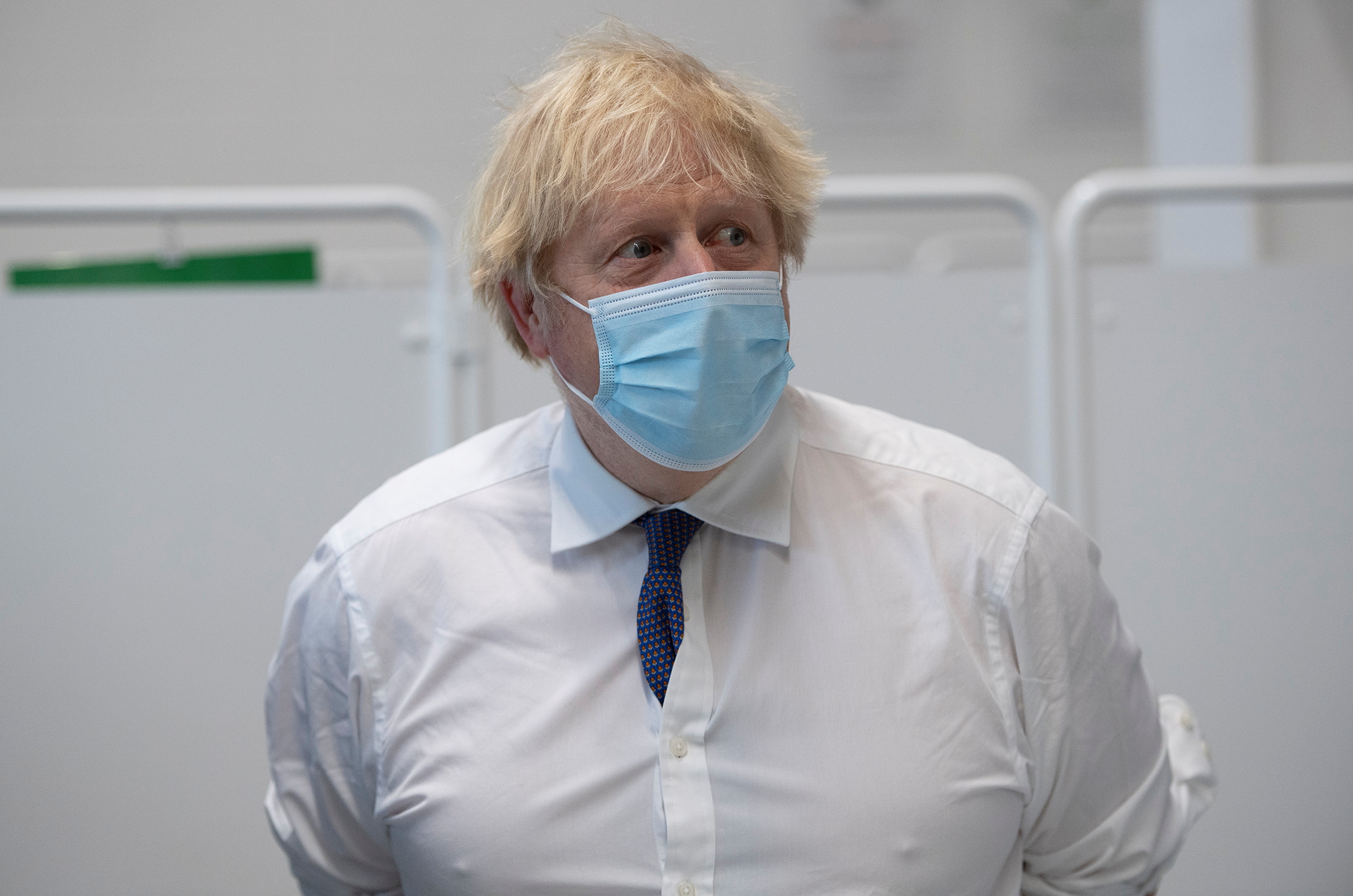Britain's Prime Minister Boris Johnson visits a COVID-19 vaccination centre, at Ashton Stadium in Bristol, Britain January 11, 2021. Eddie Mulholland