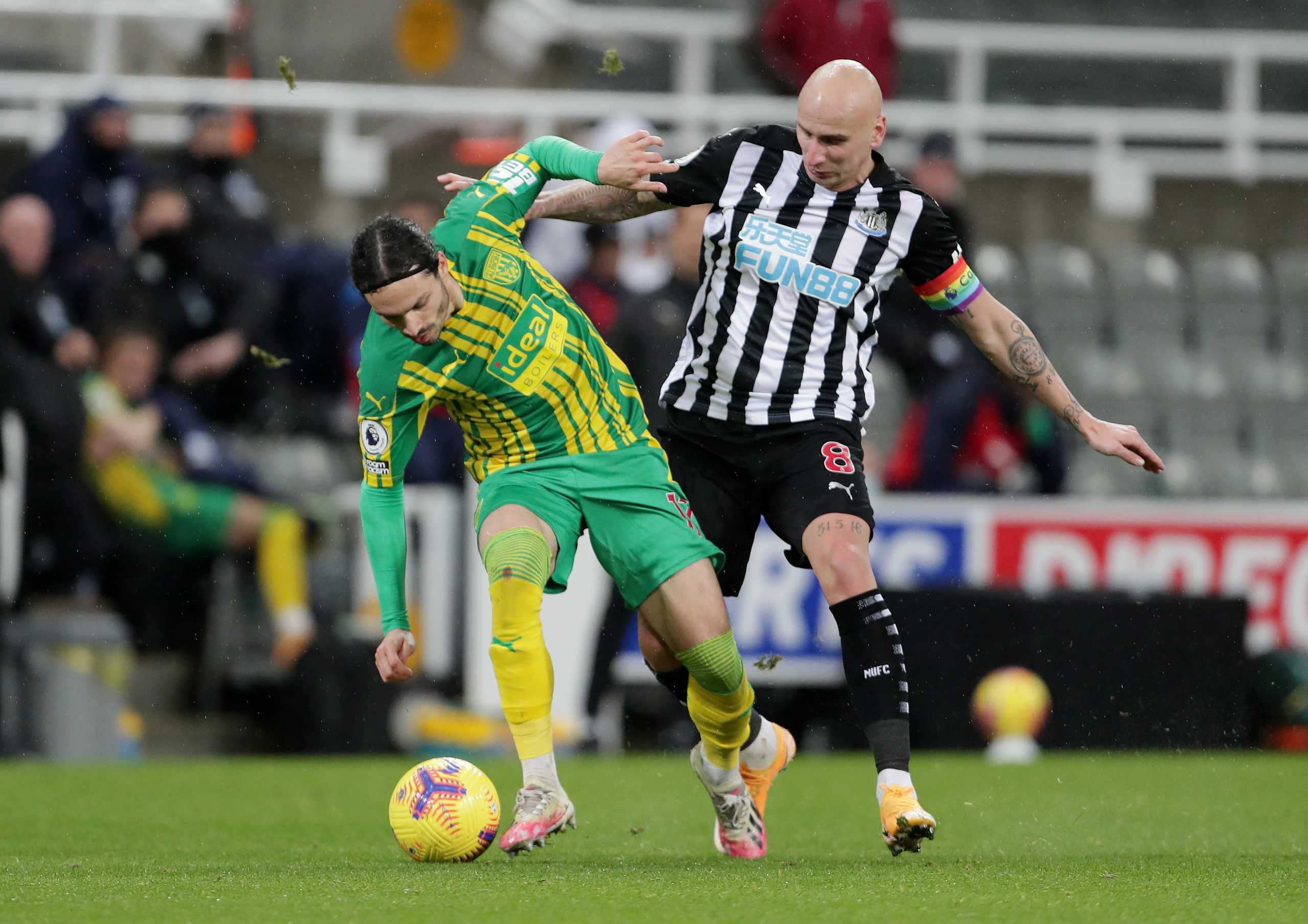 Soccer Football - Premier League - Newcastle United v West Bromwich Albion - St James' Park, Newcastle, Britain - December 12, 2020 West Bromwich Albion's Filip Krovinovic in action with Newcastle United's Jonjo Shelvey Pool via REUTERS