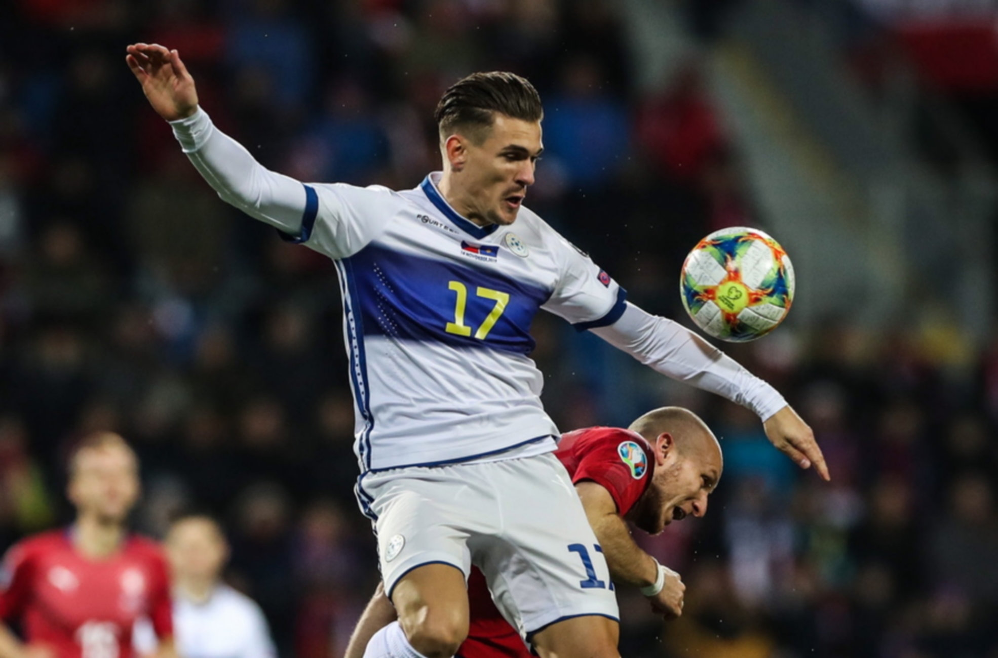 epa07996791 Michael Krmencik (R) of Czech Republic  in action against Benjamin Kololli of Kosovo during the UEFA EURO 2020 qualifier soccer match between Czech Republic and Kosovo in Plzen, Czech Republic, 14 November 2019.  EPA