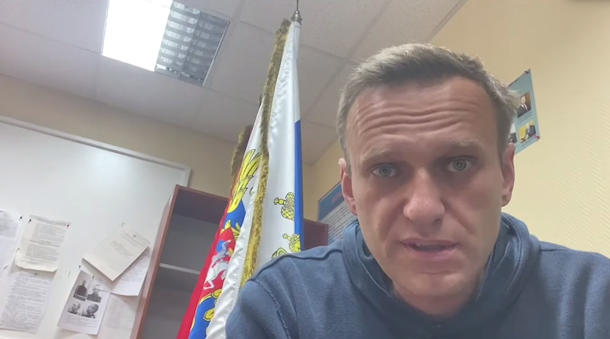 Russian opposition leader Alexei Navalny speaks as he waits for a court hearing in a police station in Khimki outside Moscow, Russia January 18, 2021, in this still image from video obtained from social media. Courtesy of Instagram @NAVALNY